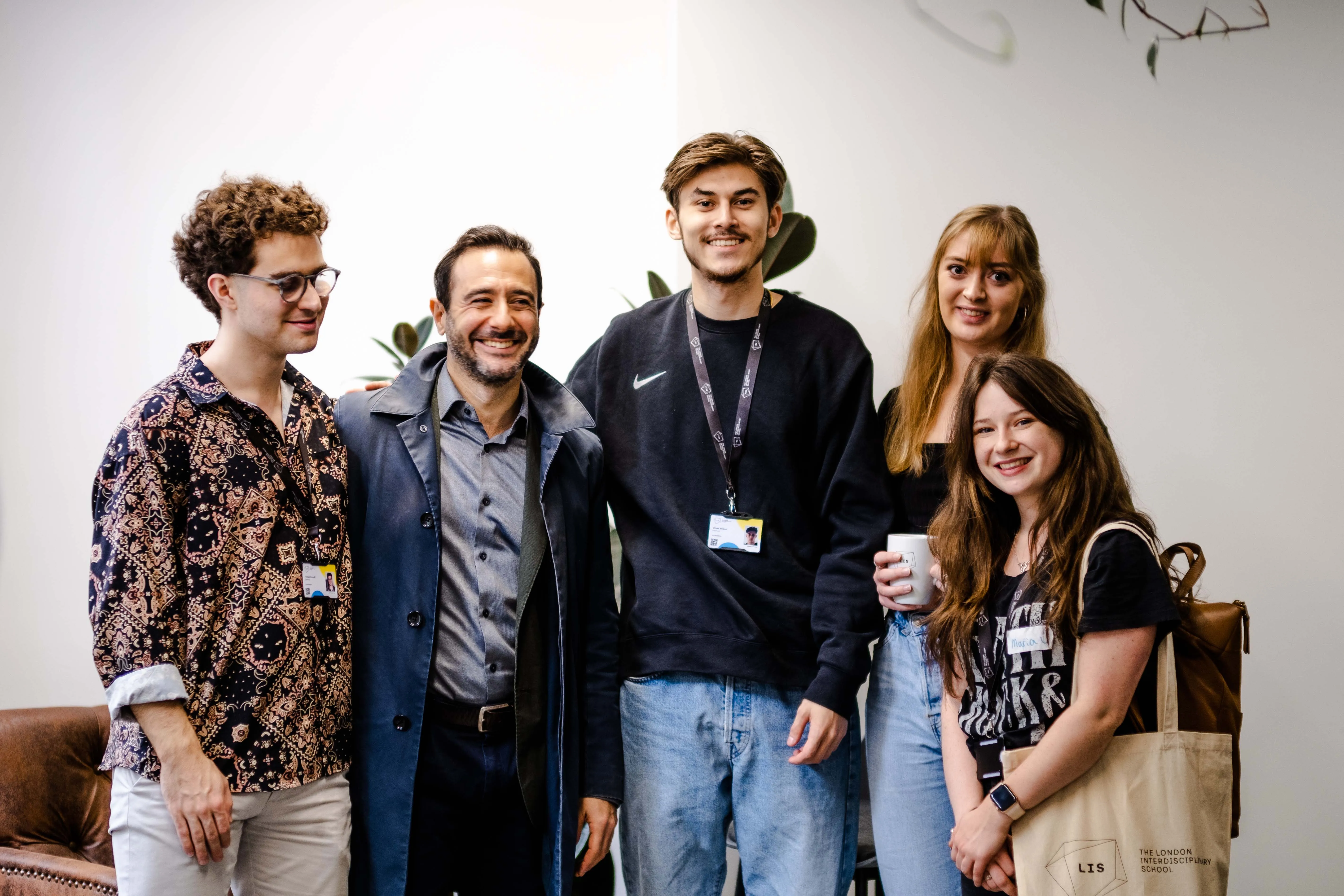A group of people smiling for a photo