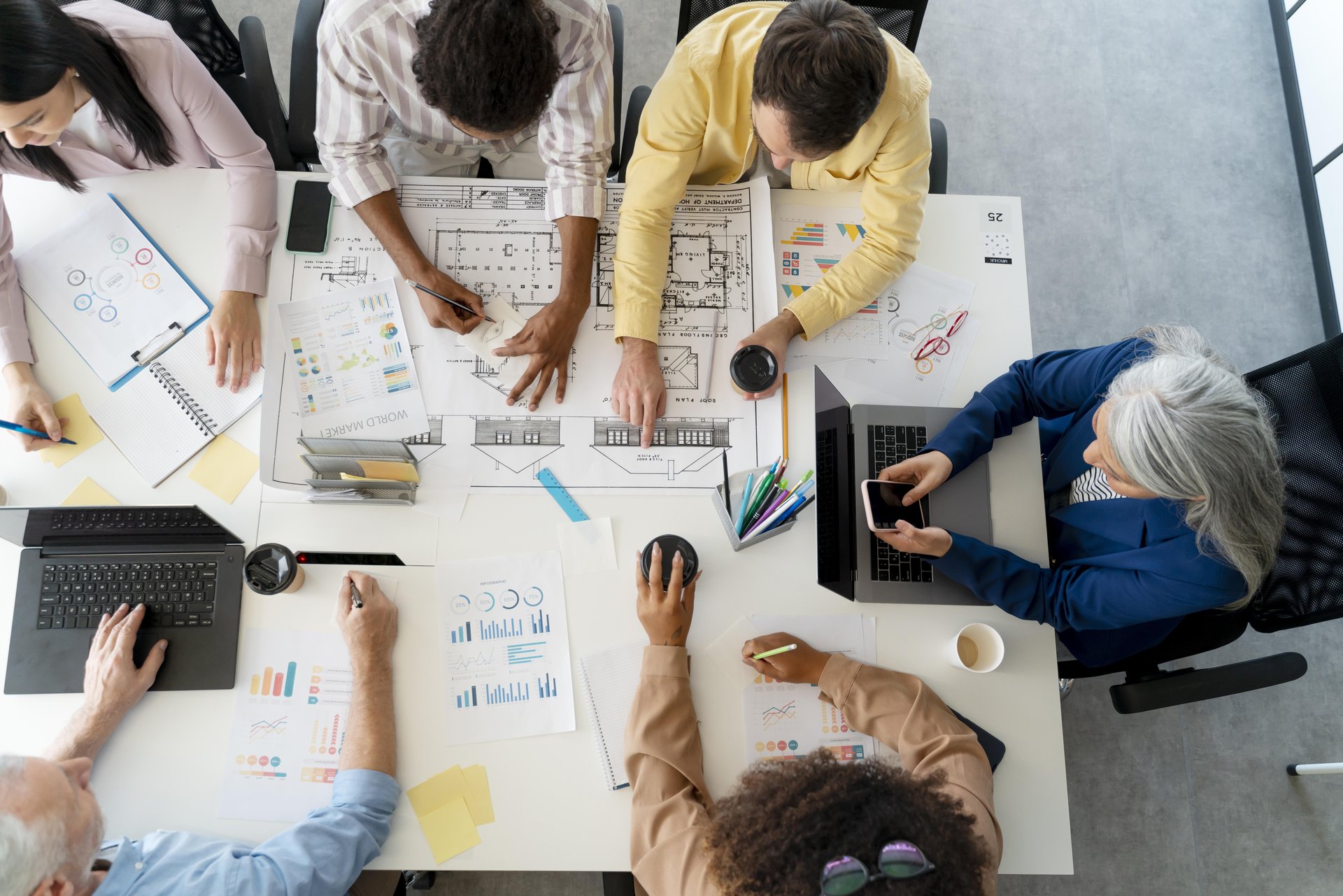 Bird's eye view of six people on a meeting