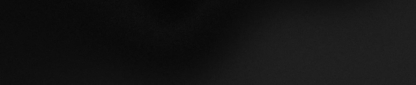 Dark textured background with subtle black and gray gradients.