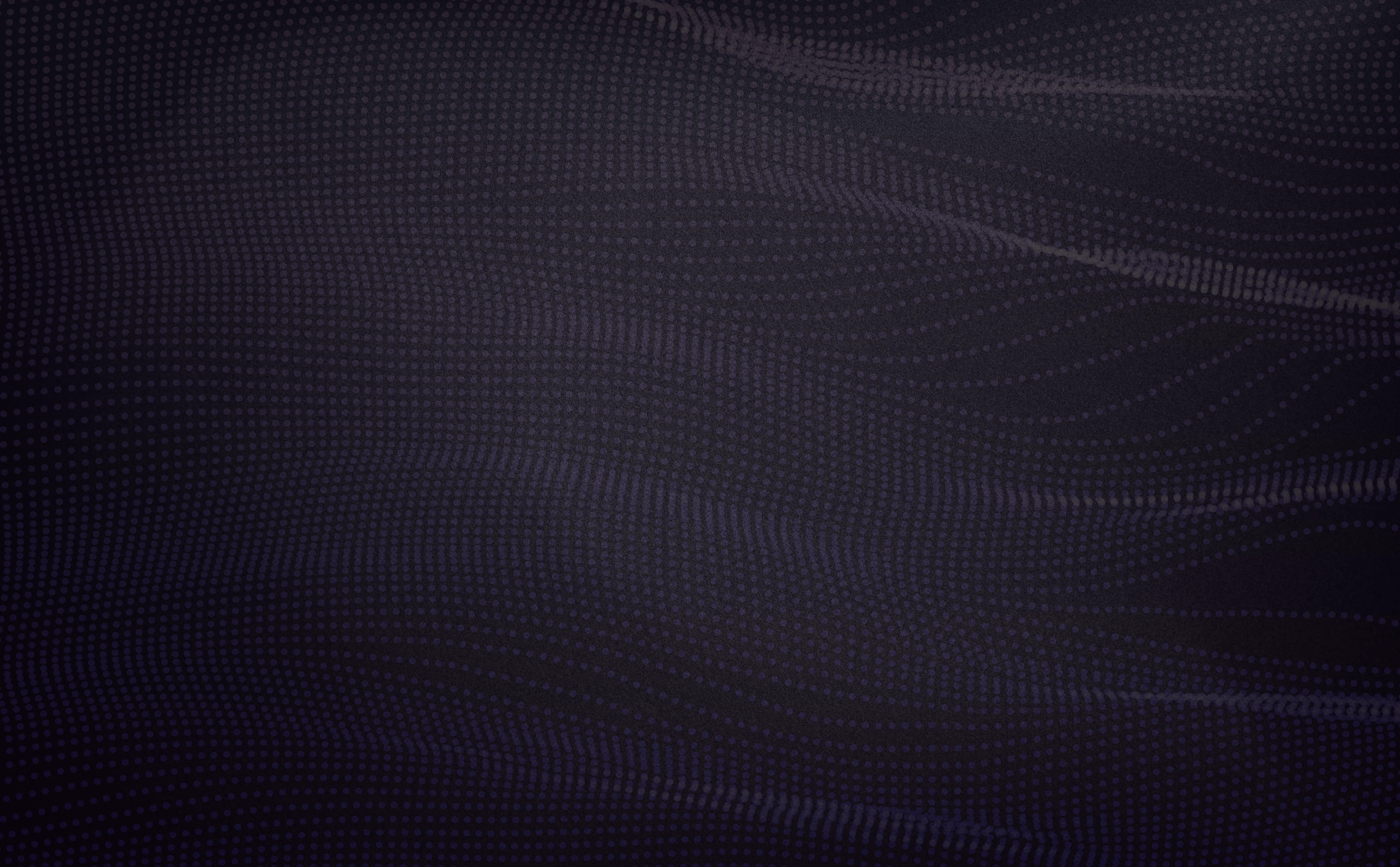 Abstract dark background with wavy patterns made of evenly spaced small purple dots.