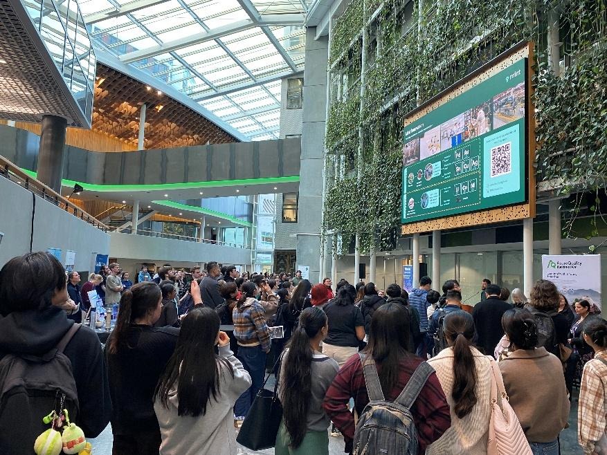 A group of people in a buildingAI-generated content may be incorrect.