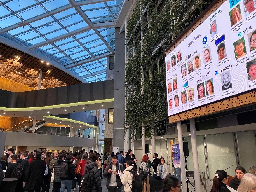 A group of people in a buildingAI-generated content may be incorrect.