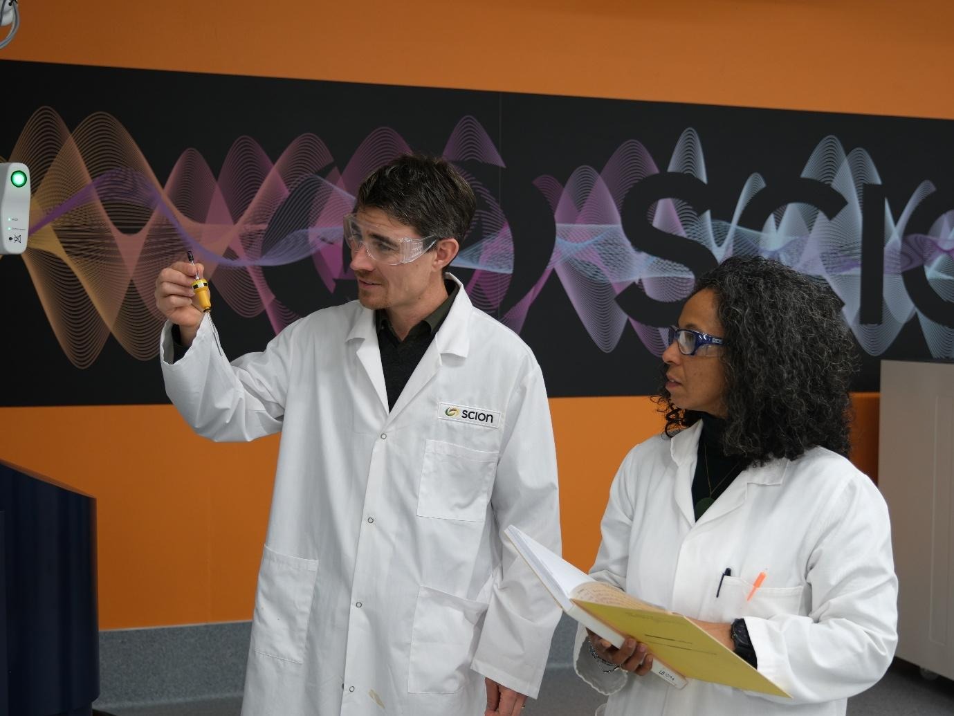 A person and person in lab coatsAI-generated content may be incorrect.