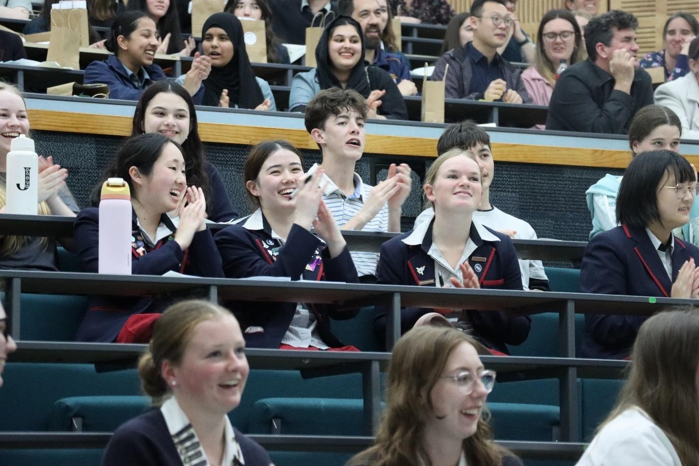 A group of people in bleachersAI-generated content may be incorrect.