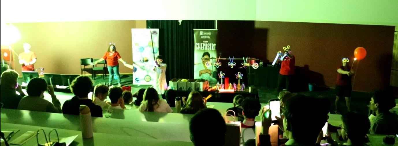 A group of people in a roomAI-generated content may be incorrect.