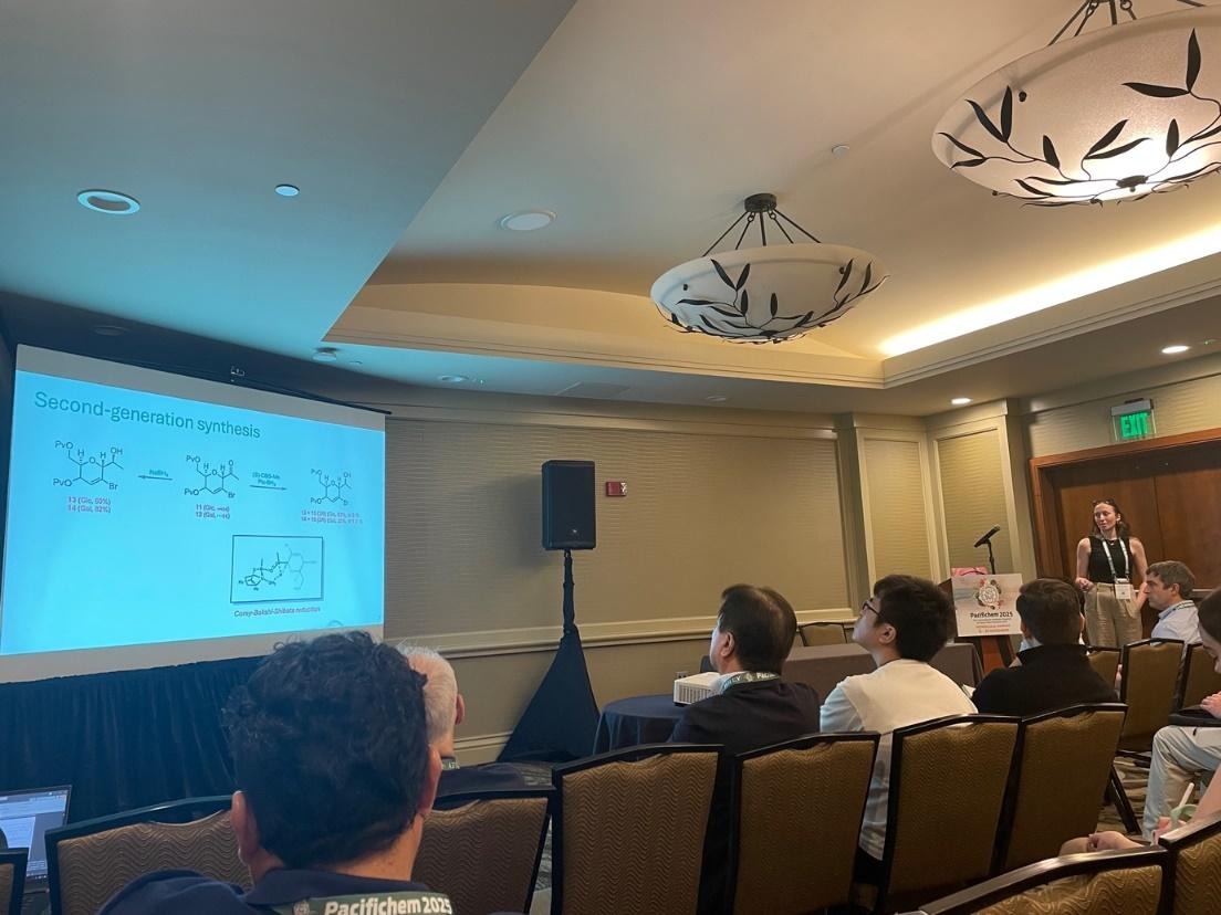 A group of people in a roomDescription automatically generated