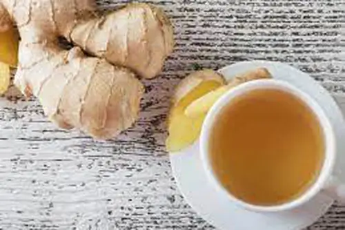 Uống trà gừng ấm điều trị mụn rộp sinh dục