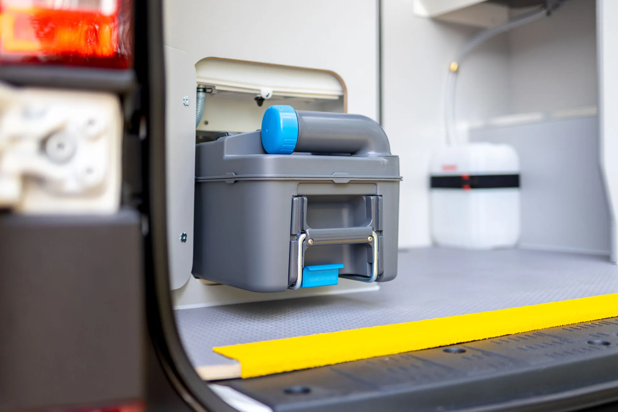 Rear toilet cassette removed part way through access hatch