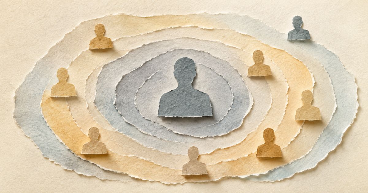 Leadership presence and impact - a leader standing confidently before their team