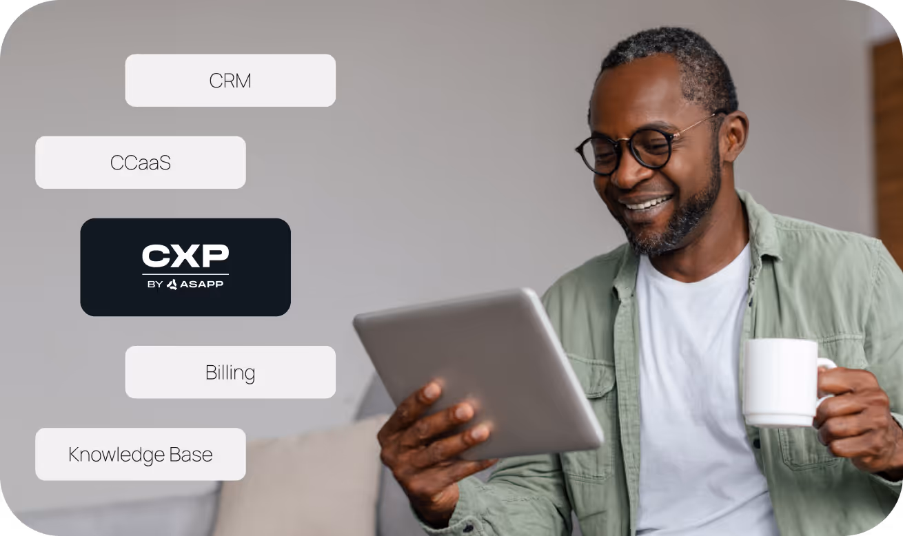 Smiling man wearing glasses holding a white mug in one hand and a tablet in the other with a CXP by ASAPP logo and technology terms on the left.