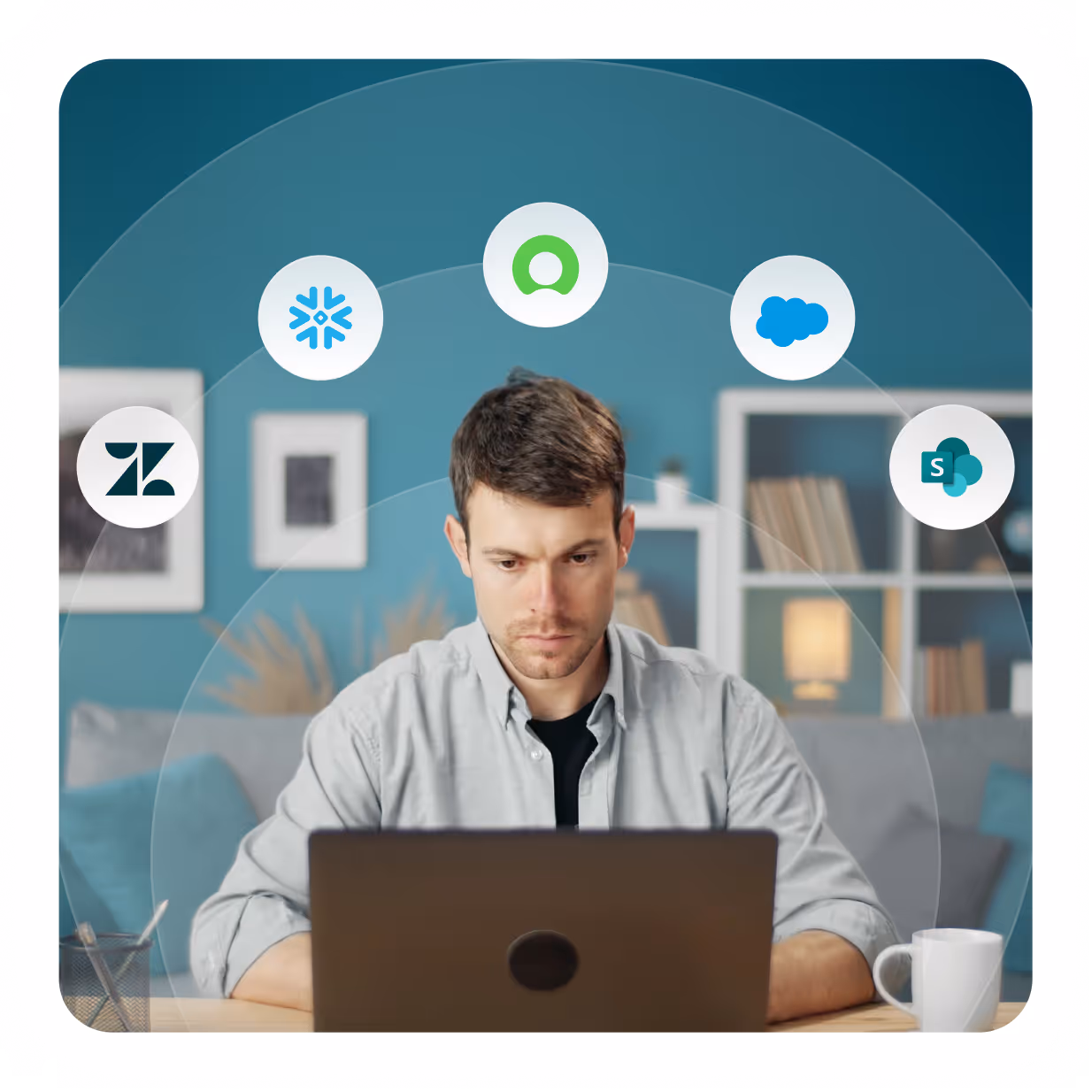 Man focused on his laptop with floating circles containing logos of Zendesk, Snowflake, Freshworks, Salesforce, and SharePoint above him.