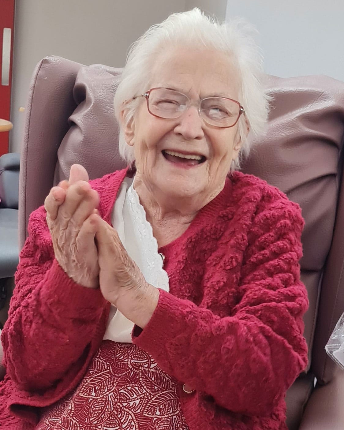 smiling and clapping