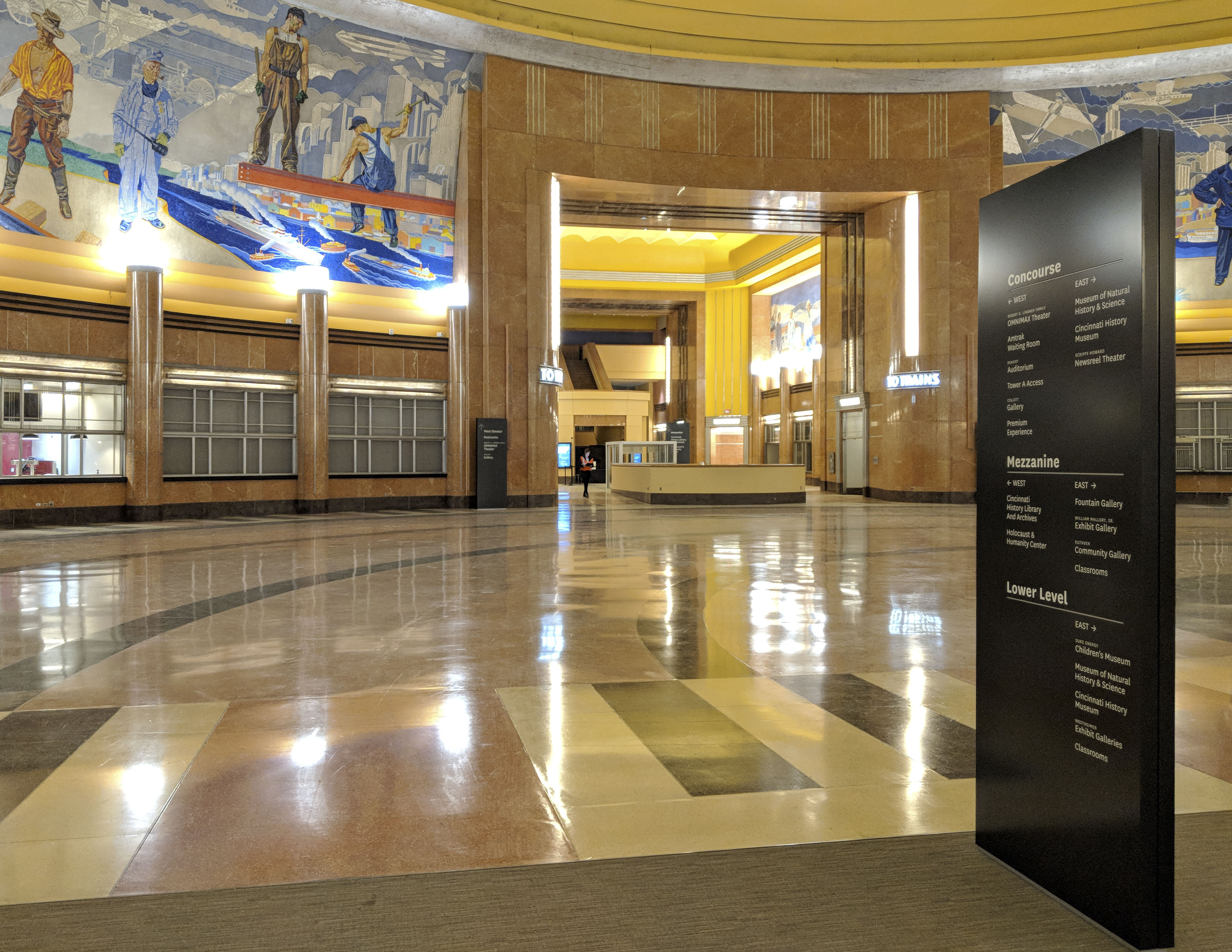 Cincinnati Museum Center historic interior floor-standing directional sign in lobby with white text on black, designed by Two Twelve
