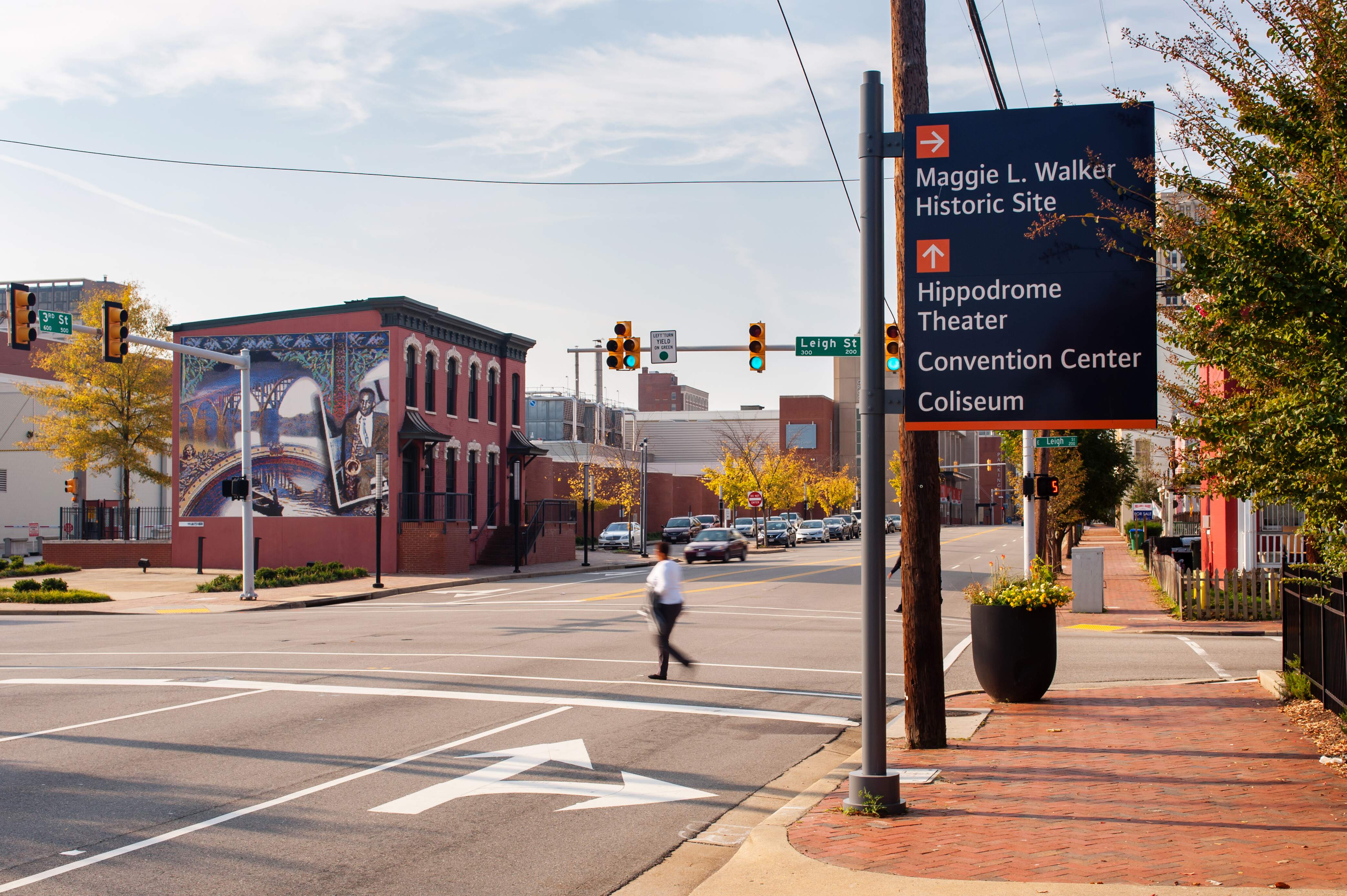 City of Richmond exterior post-mounted vehicular directional sign with orange color-coded arrows, designed by Two Twelve