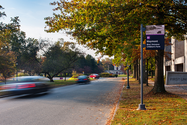 City of Richmond exterior post-mounted vehicular directional sign with purple color-coded arrows, designed by Two Twelve