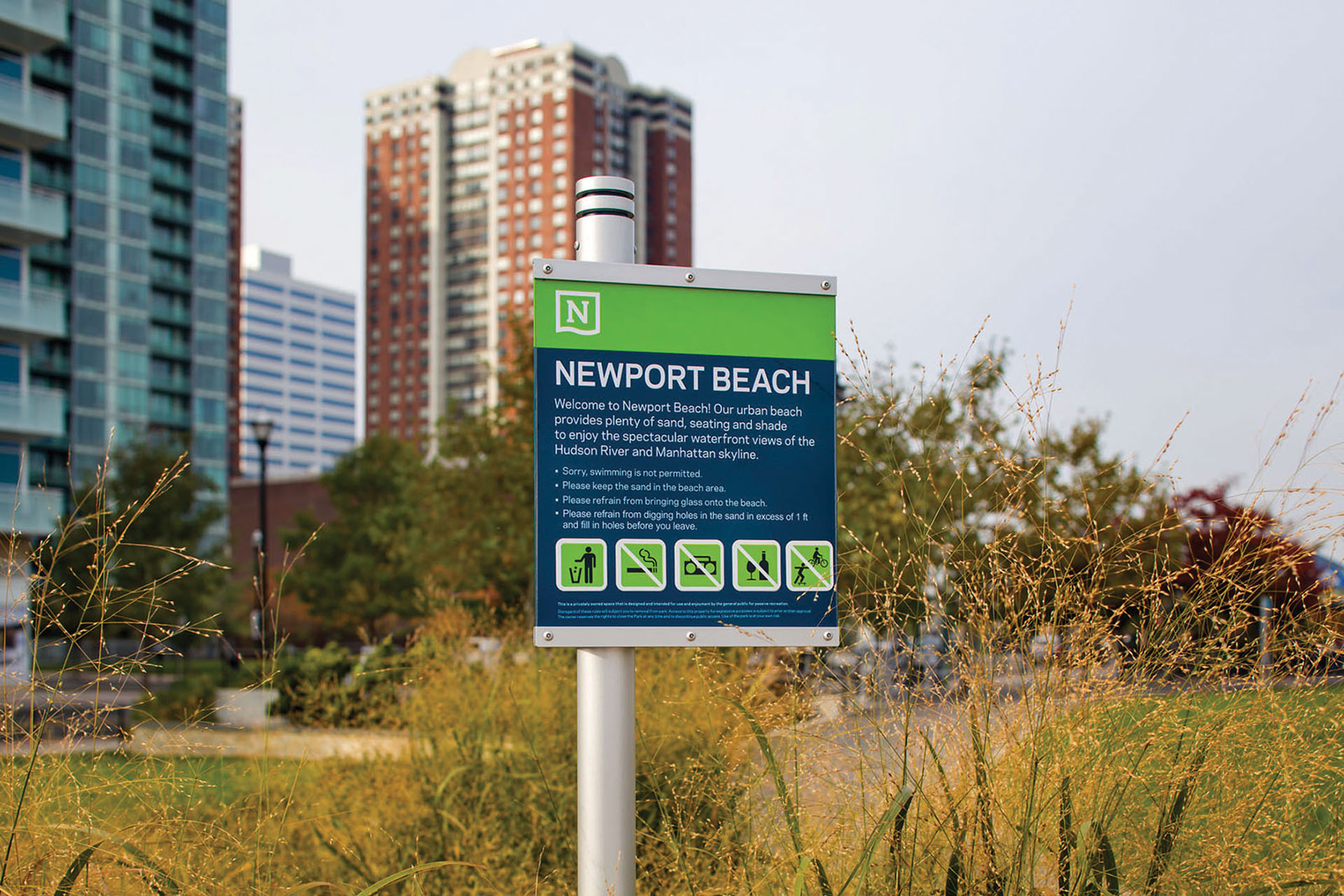 Community of Newport exterior post-mounted informational sign for Newport Beach with rules and icons, designed by Two Twelve