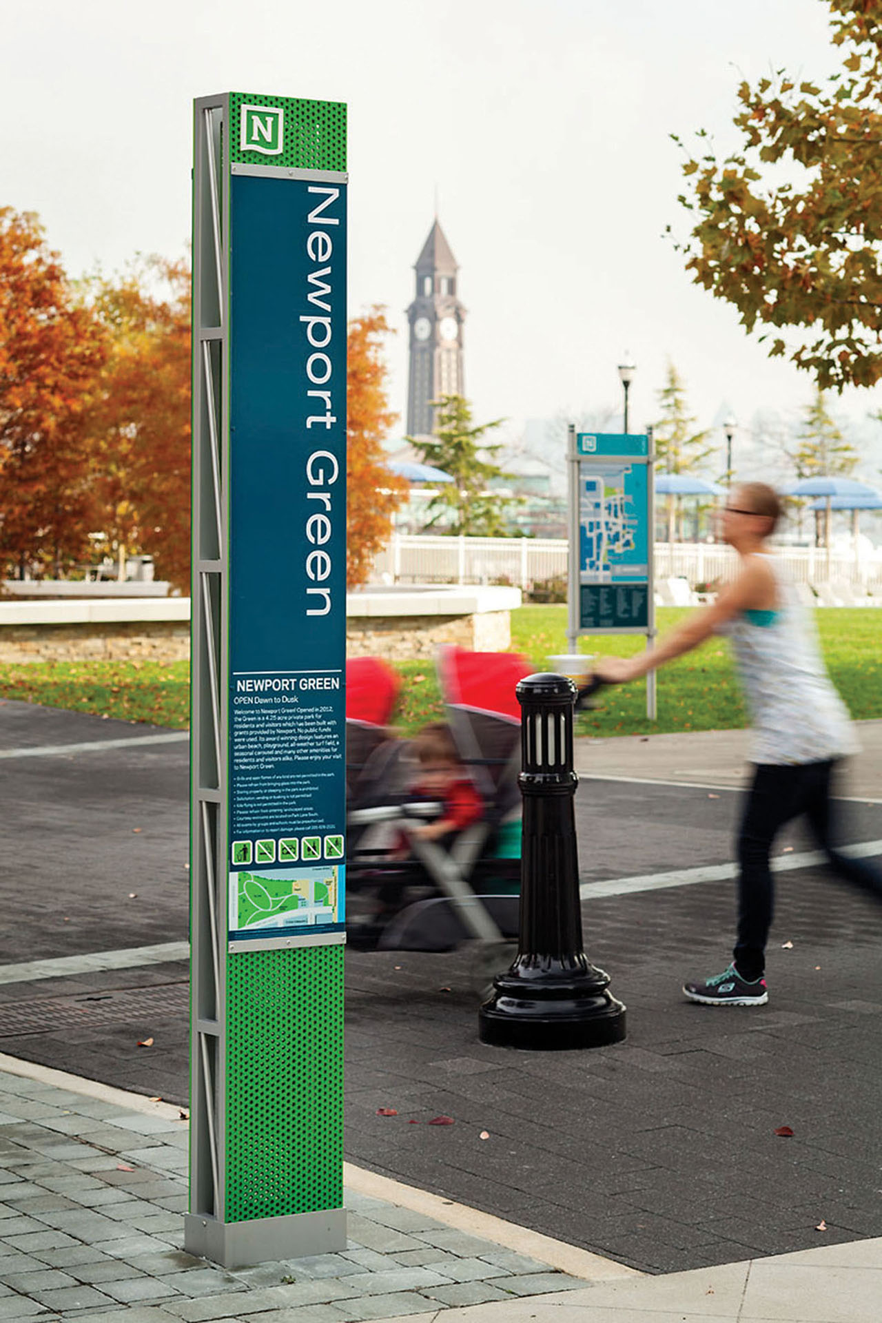 Community of Newport exterior post-mounted pedestrian identification sign with rules and accessible map, designed by Two Twelve