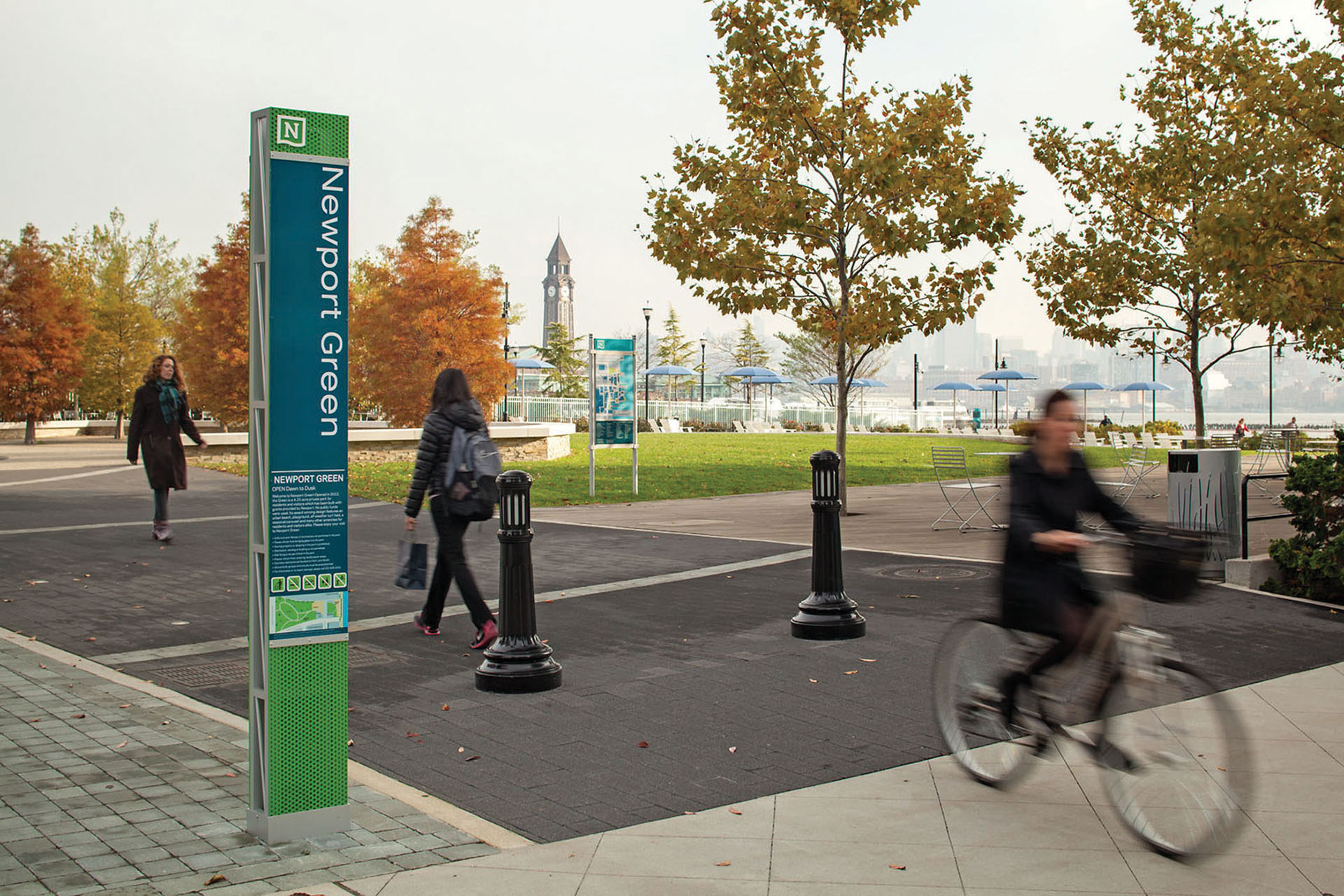 Community of Newport exterior post-mounted pedestrian identification sign with rules and accessible map, designed by Two Twelve