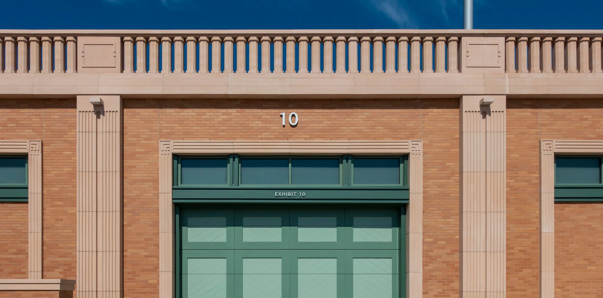 Dickies Arena exterior loading gate 10 sports venue signage, designed by Two Twelve