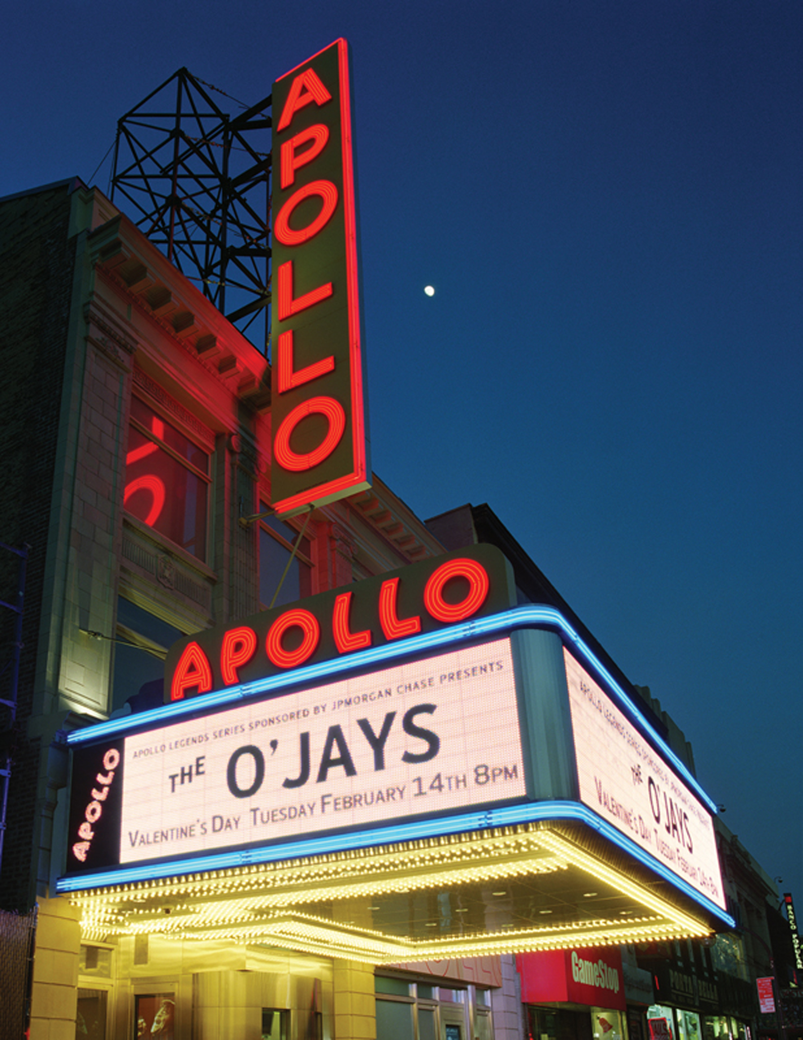 Apollo Theater exterior theater identification with illuminated red LED digital dynamic displays, designed by Two Twelve