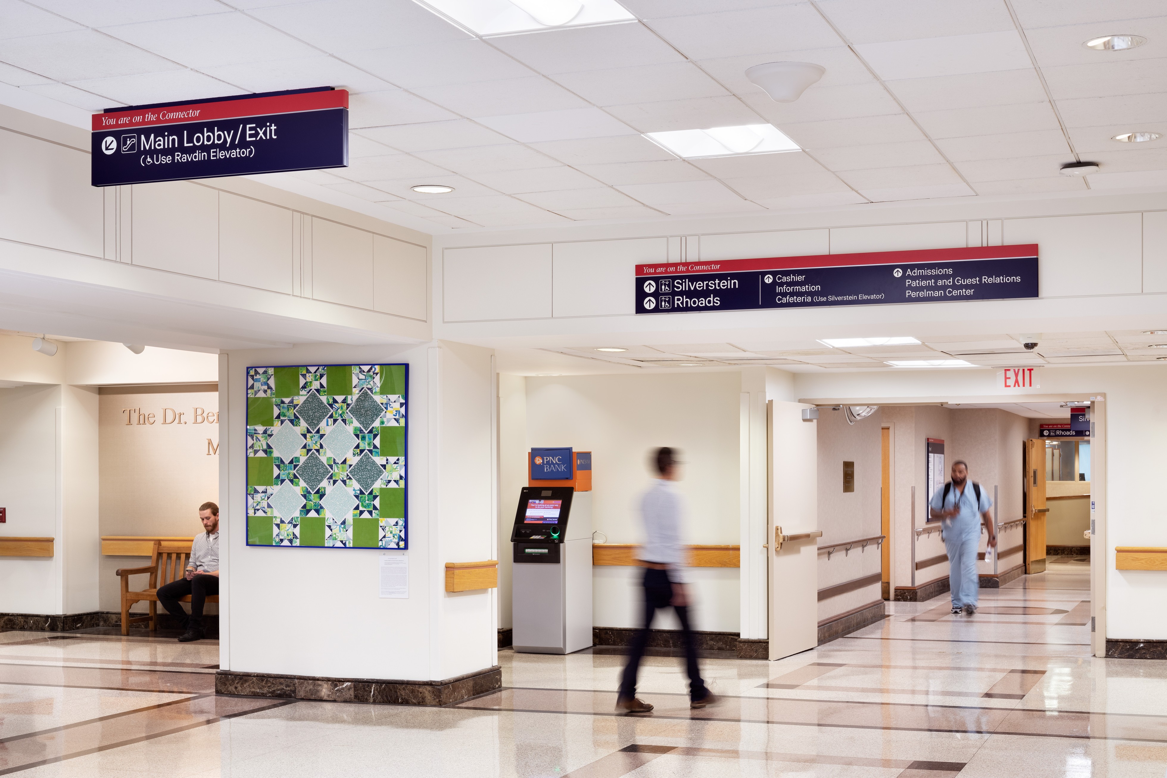Penn Medicine overhead directional signage with connector identification, designed by Two Twelve