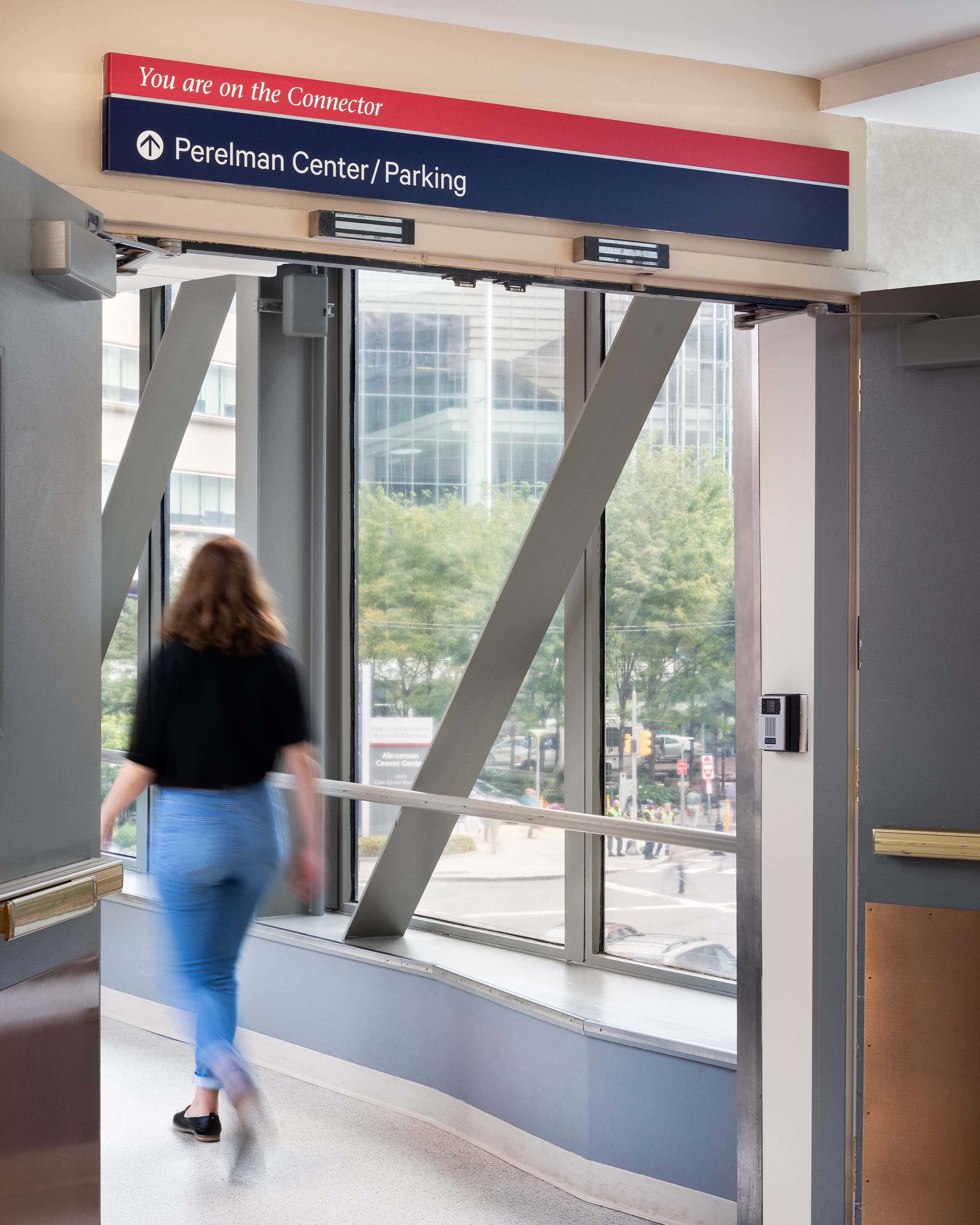 Penn Medicine overhead directional signage with connector identification, designed by Two Twelve