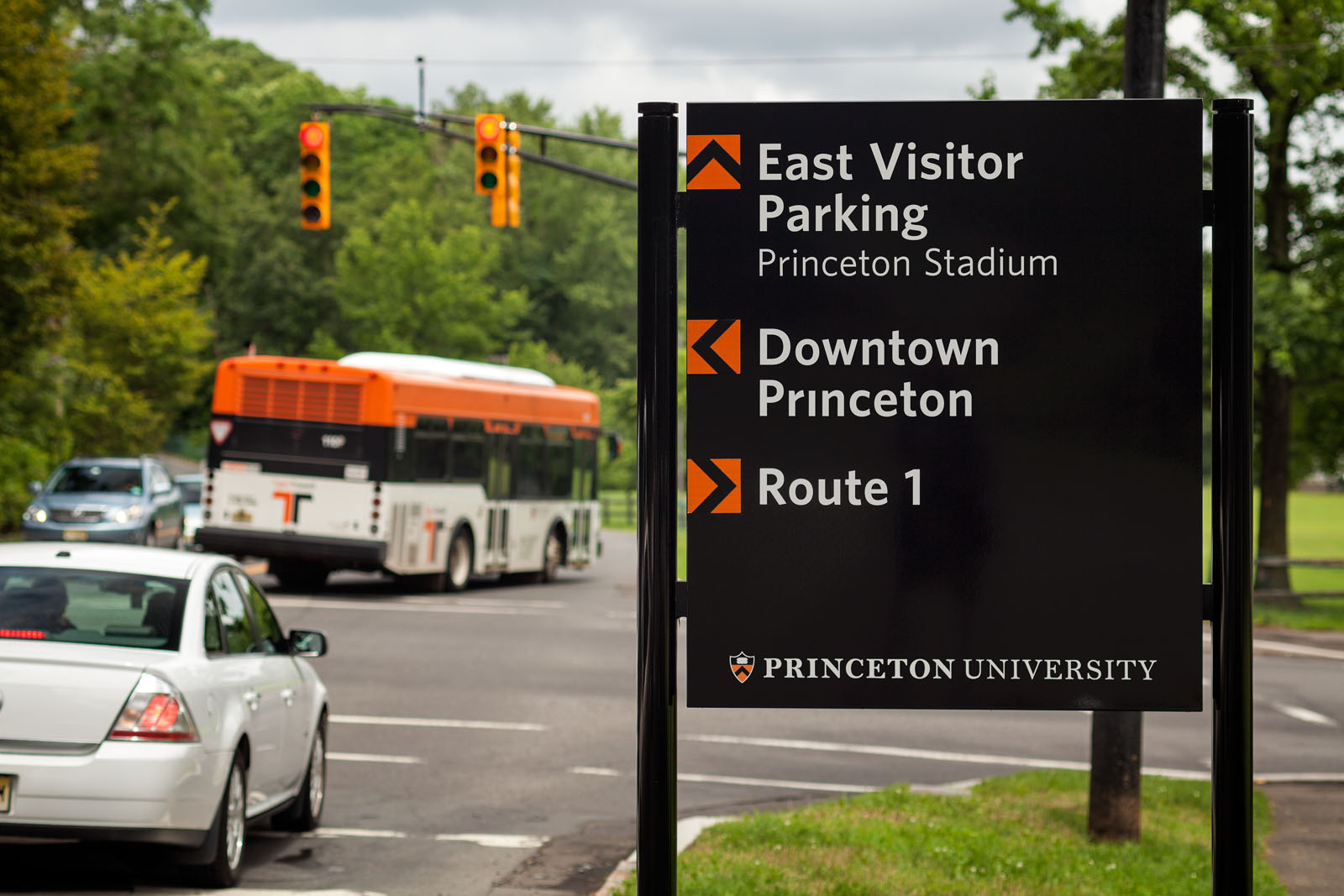 Princeton University exterior vehicular directional sign to East Visitor Parking and Downtown Princeton, designed by Two Twelve