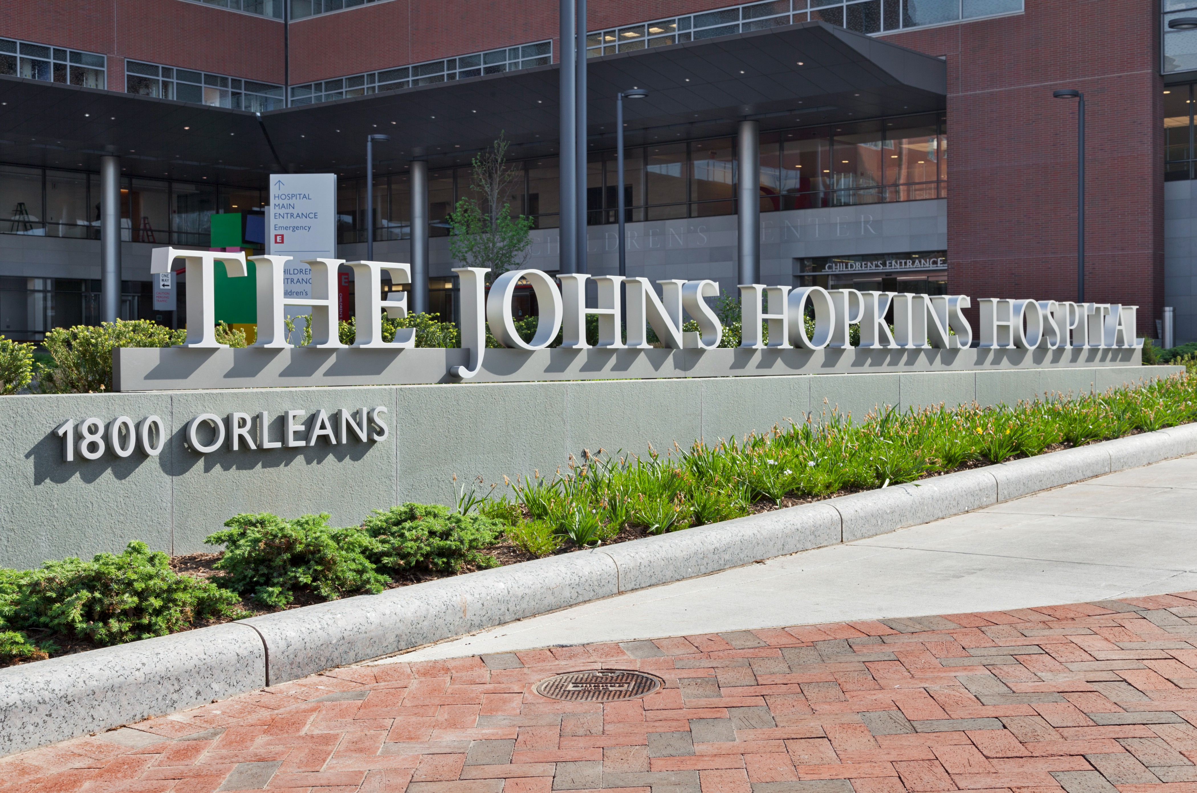 The Johns Hopkins Hospital exterior building identification with dimensional aluminum letters, designed by Two Twelve