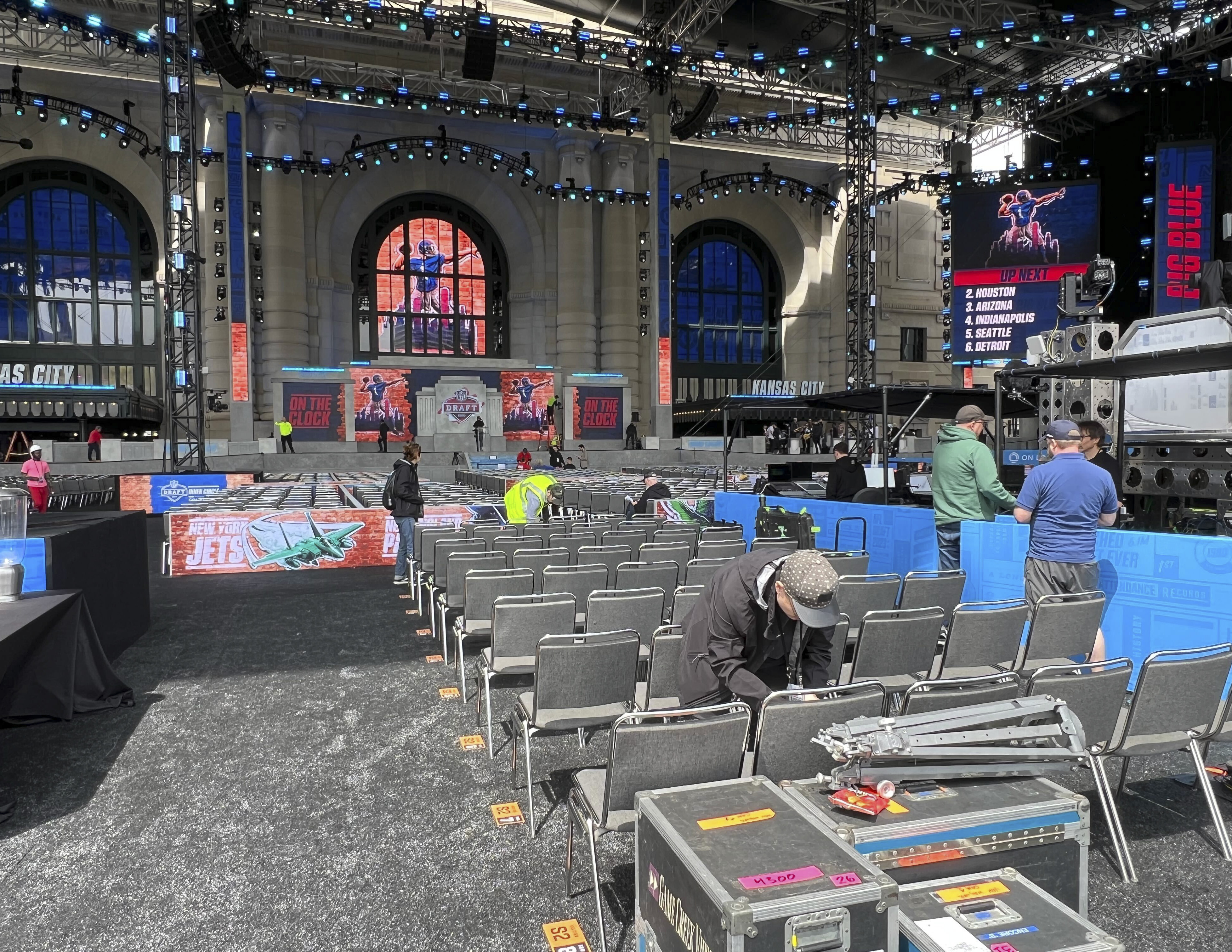 2023 NFL Kansas City Draft Theater installing row identification markers, designed by Two Twelve
