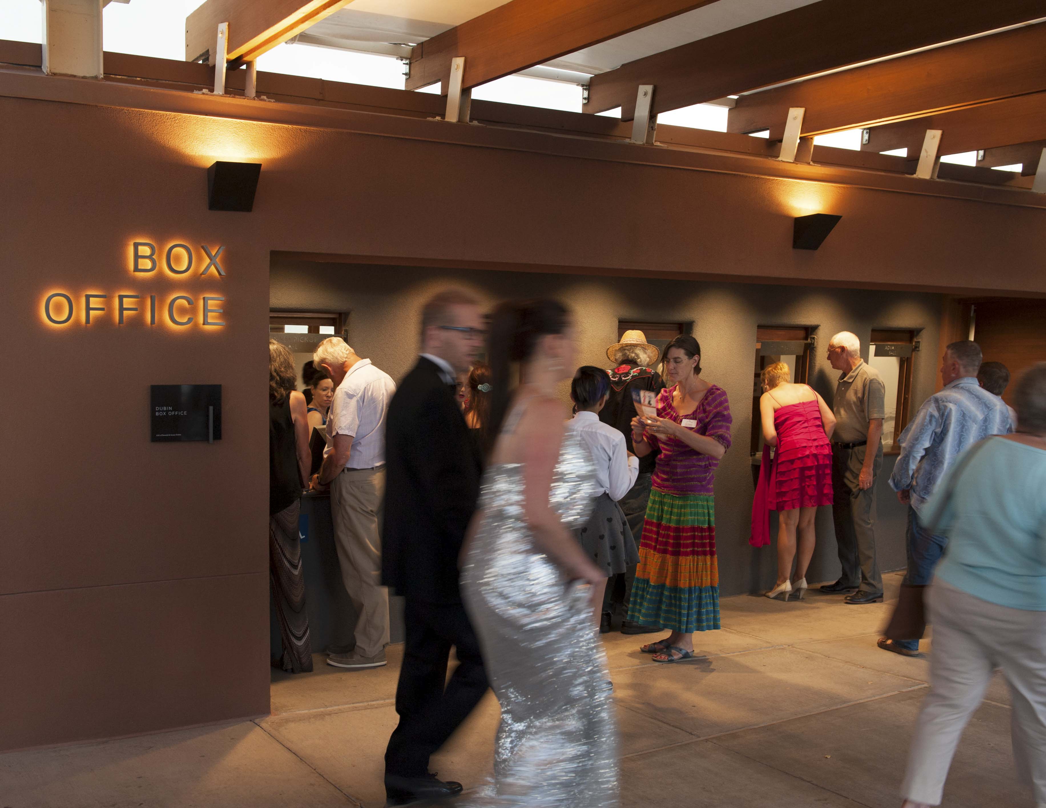 The Santa Fe Opera box office halo illuminated stainless steel signs with ADA room sign, designed by Two Twelve