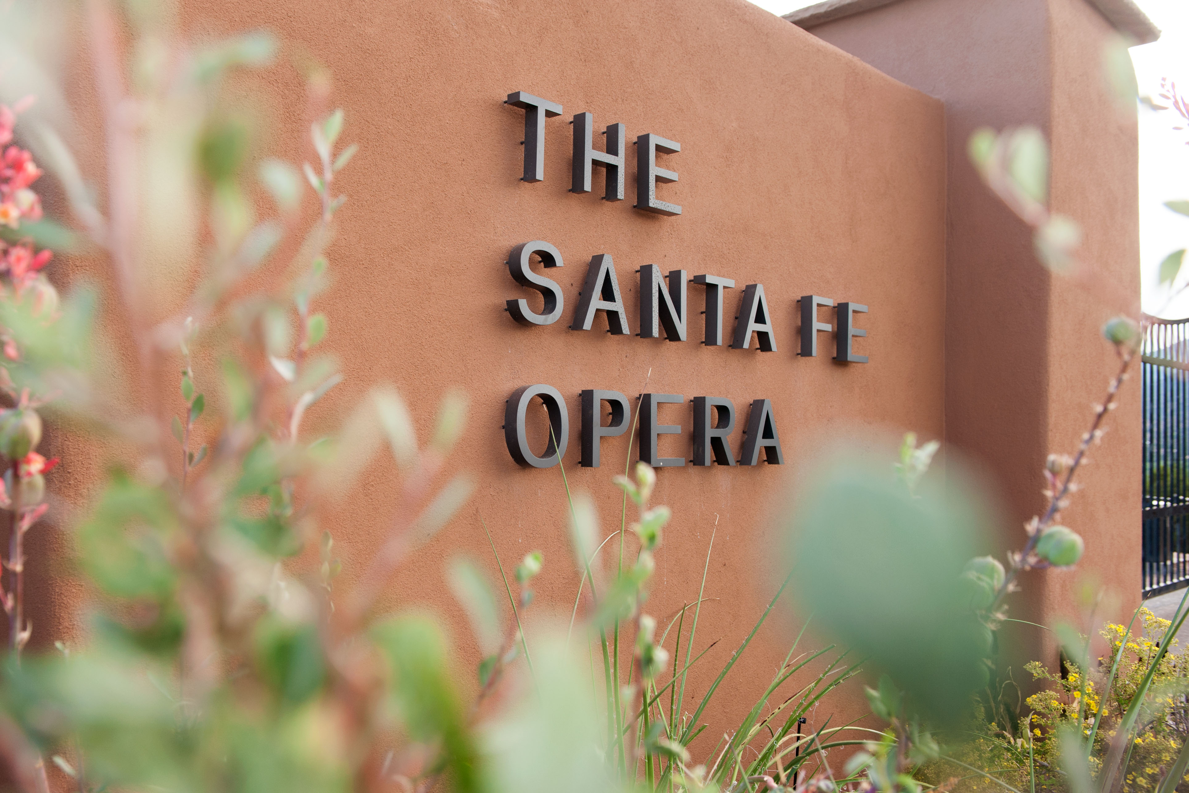 The Santa Fe Opera exterior building identification with pinned lettering on painted aluminum, designed by Two Twelve