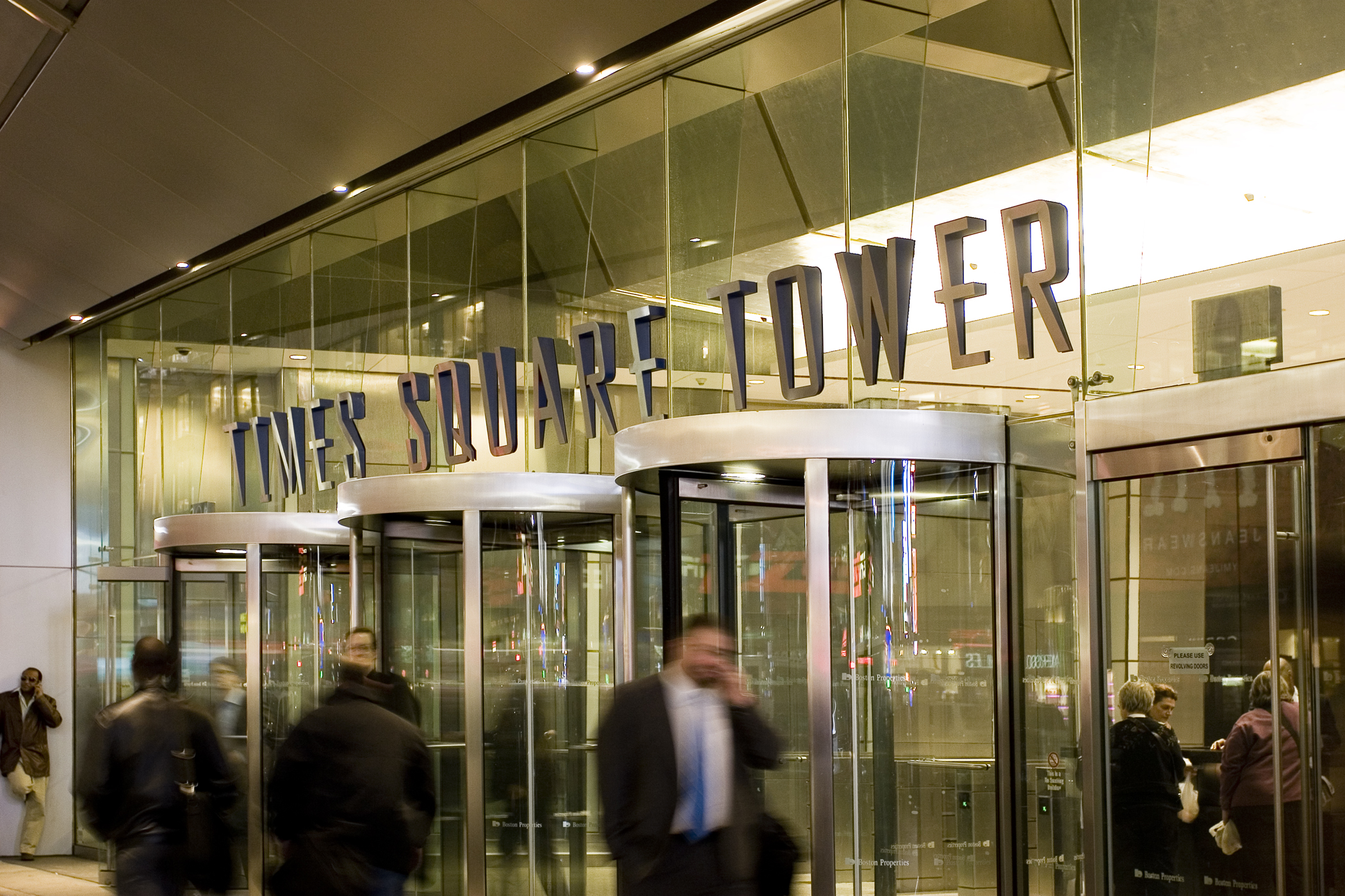 Times Square Tower exterior building sign with dynamic metal lettering, designed by Two Twelve