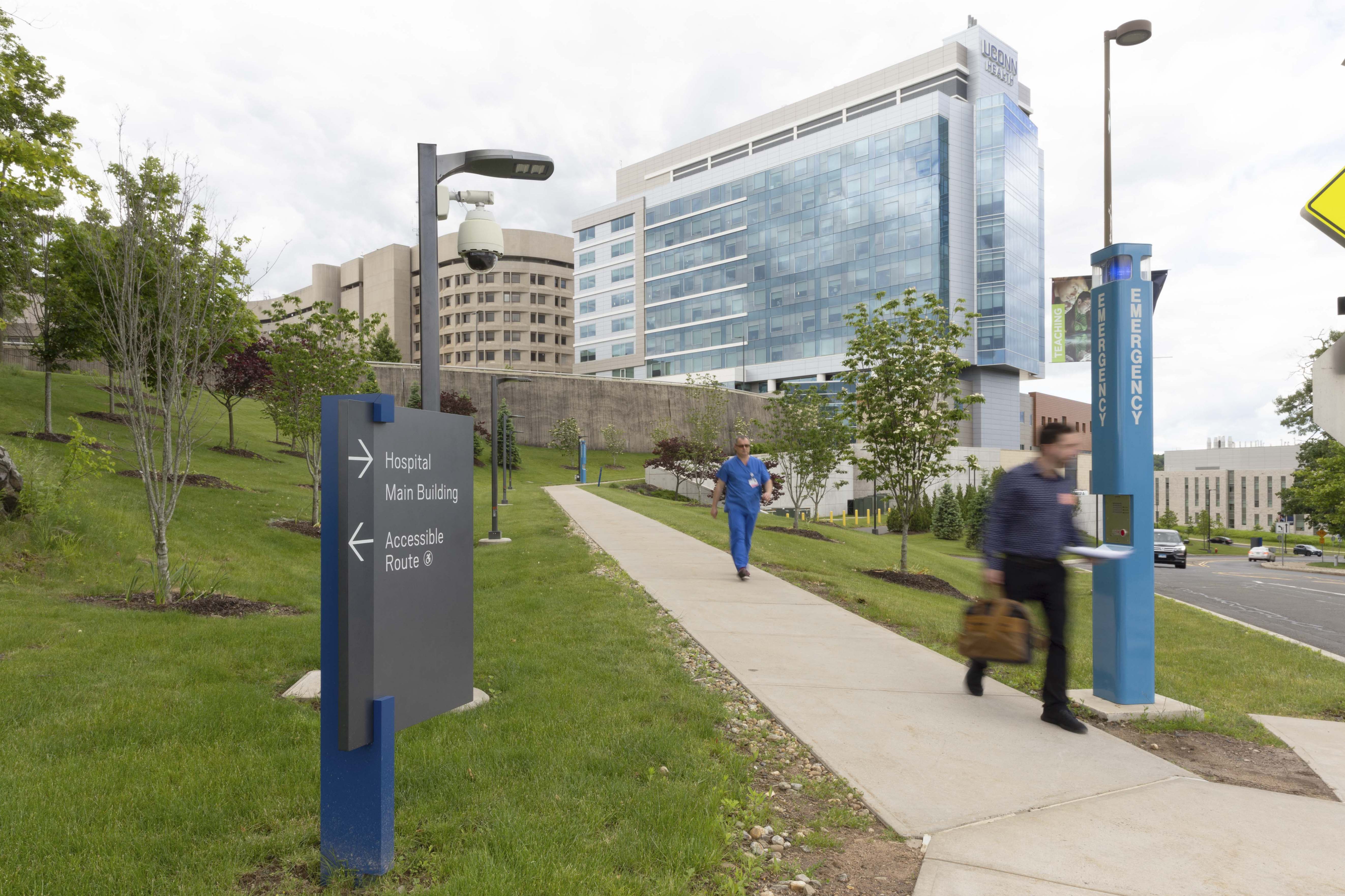 University of Connecticut post-mounted pedestrian directional signage, designed by Two Twelve