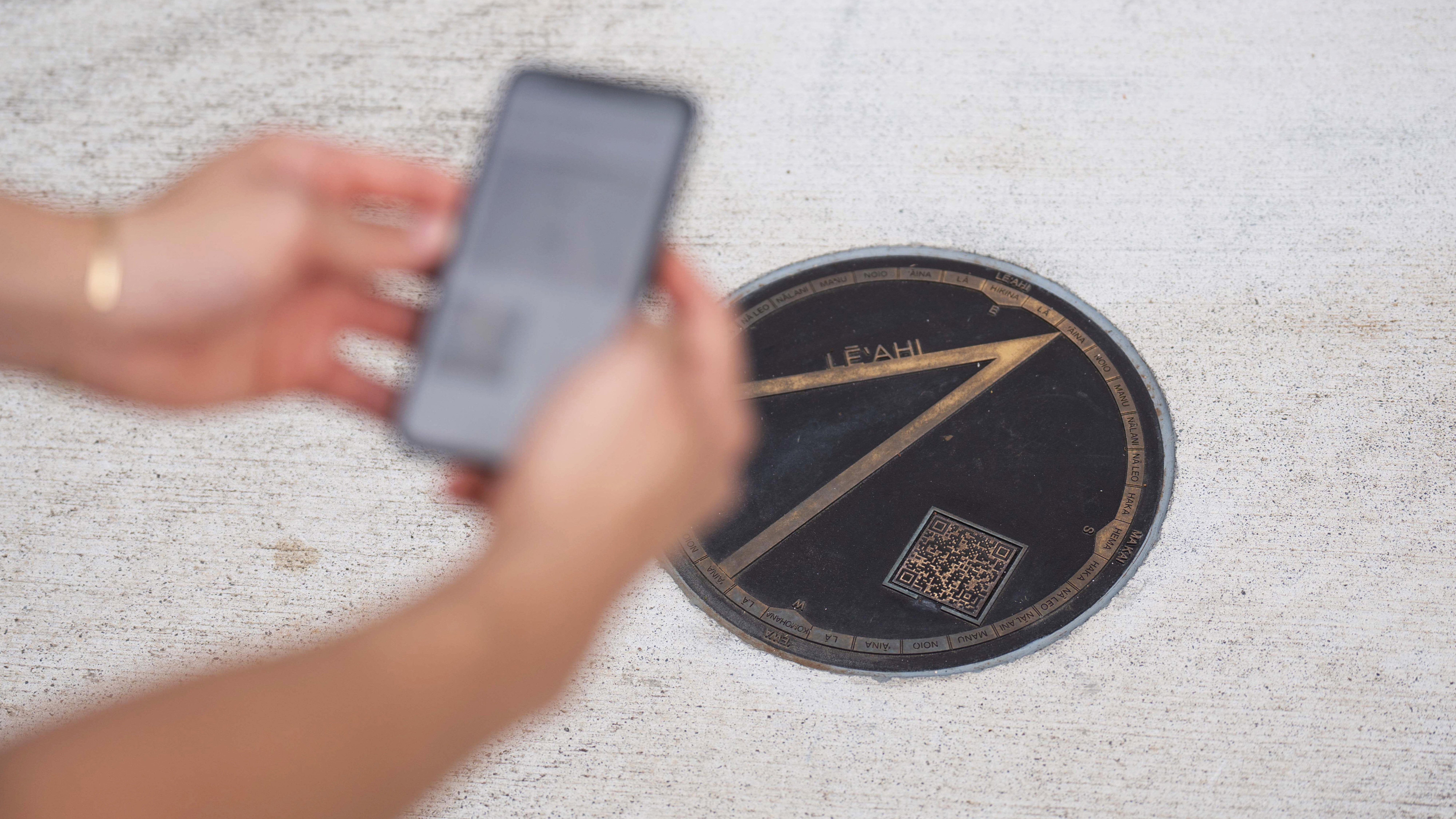 University of Hawaii Manoa exterior floor inset brass directional wayfinding, designed by Two Twelve
