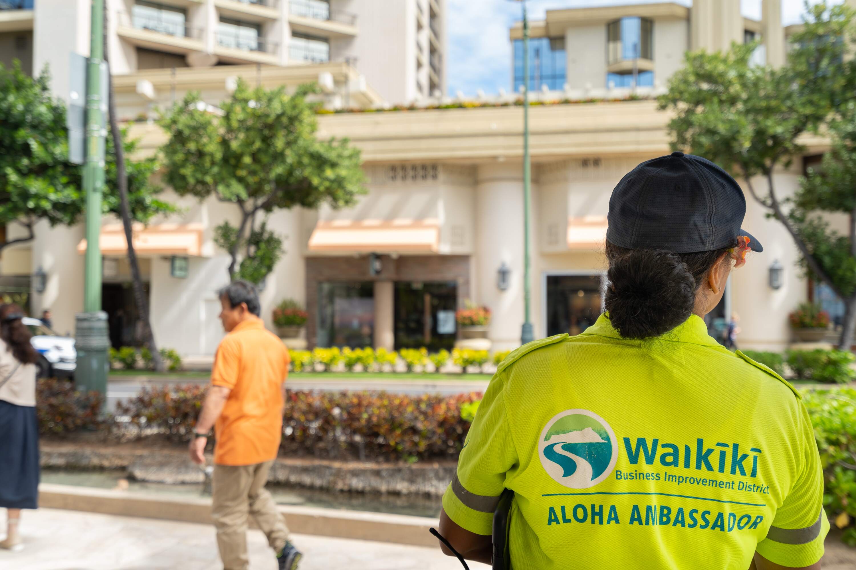 Waikiki wayfinding logo on polo shirt, designed by Two Twelve