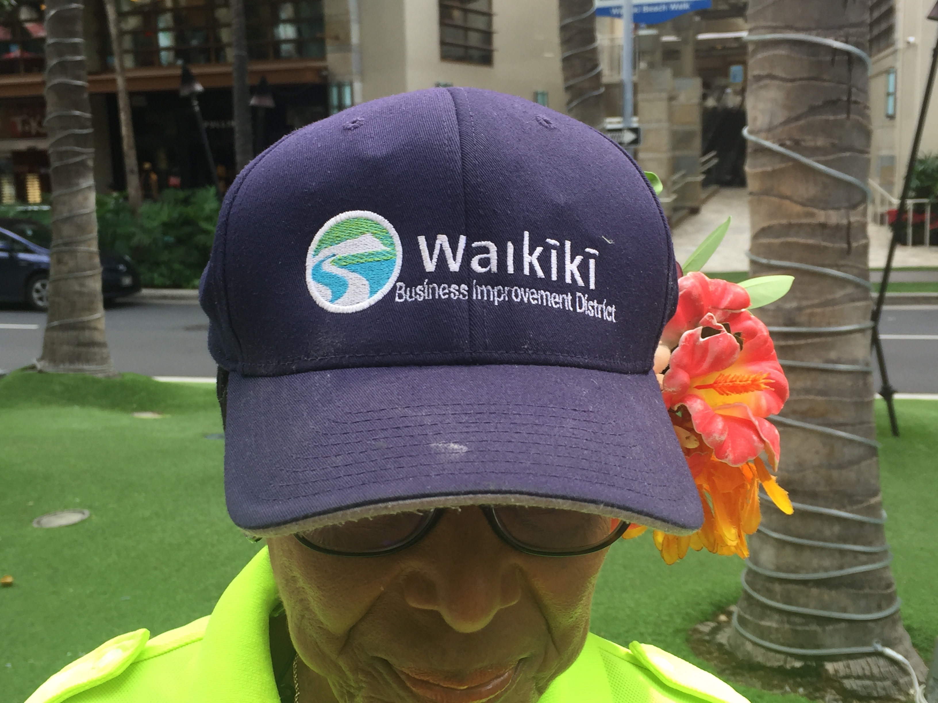 Waikiki wayfinding logo on hat, designed by Two Twelve
