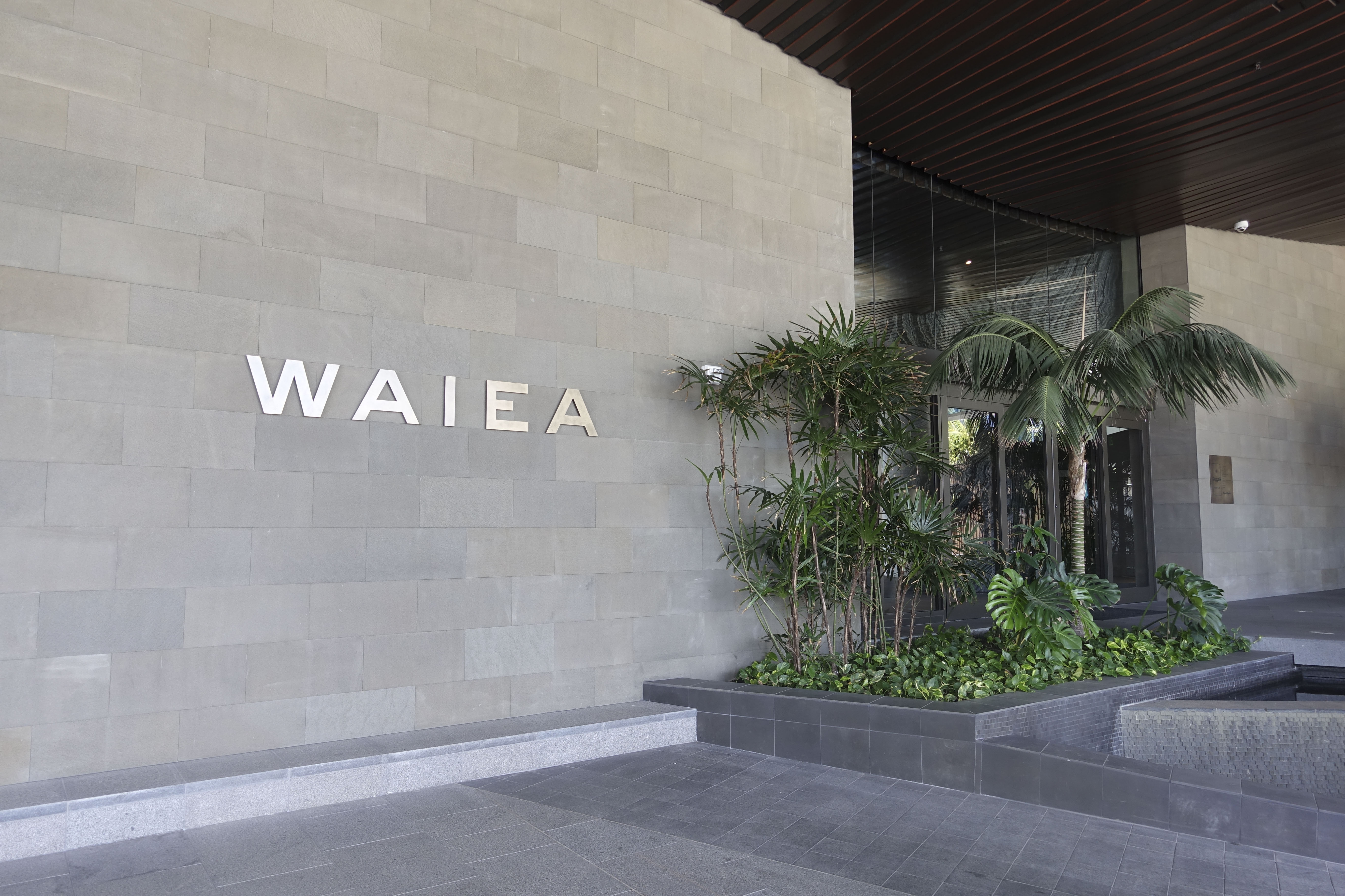 Ward Village exterior stainless steel Koula building signage, designed by Two Twelve