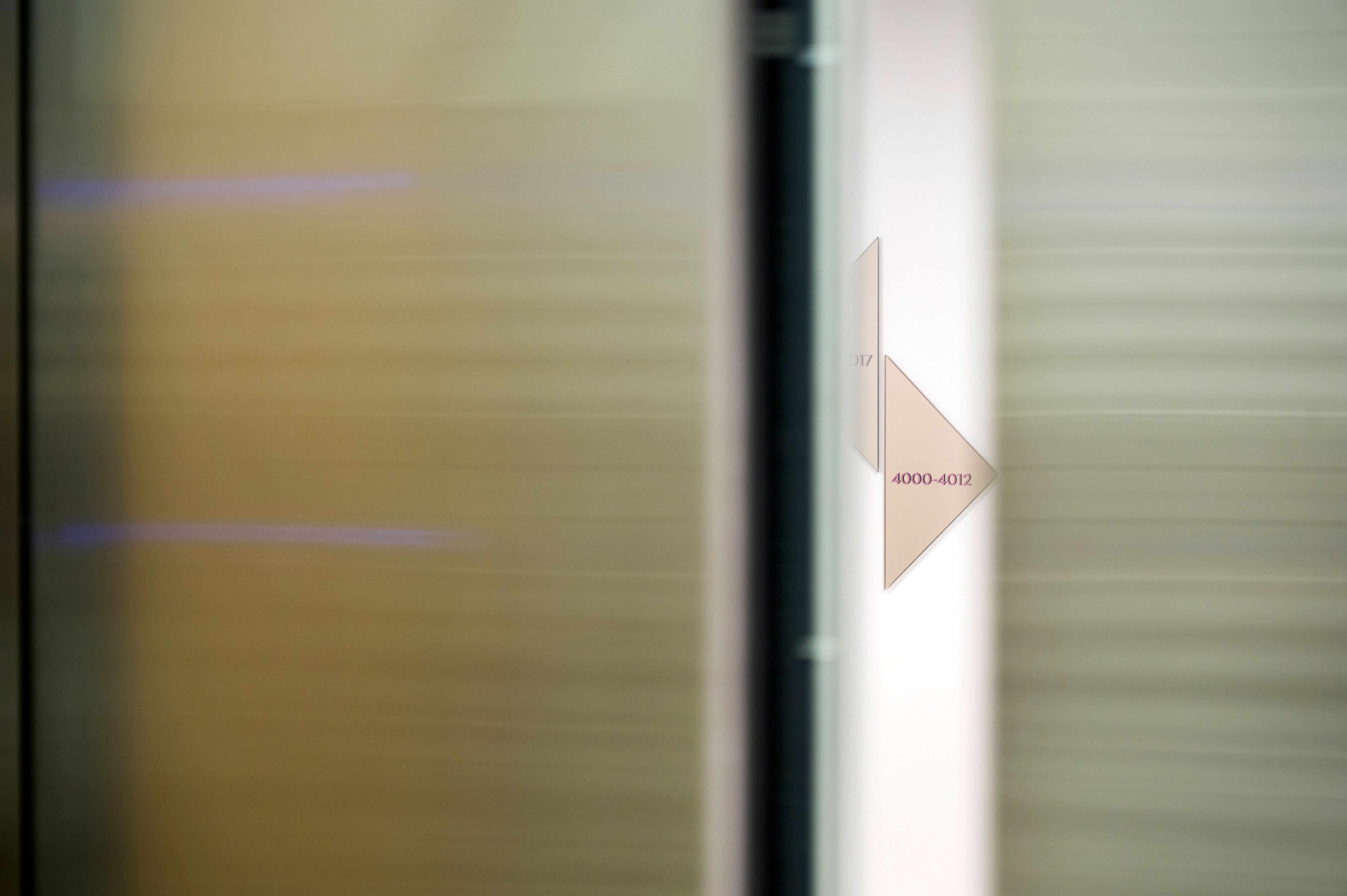Ward Village interior elevator directional signage, designed by Two Twelve
