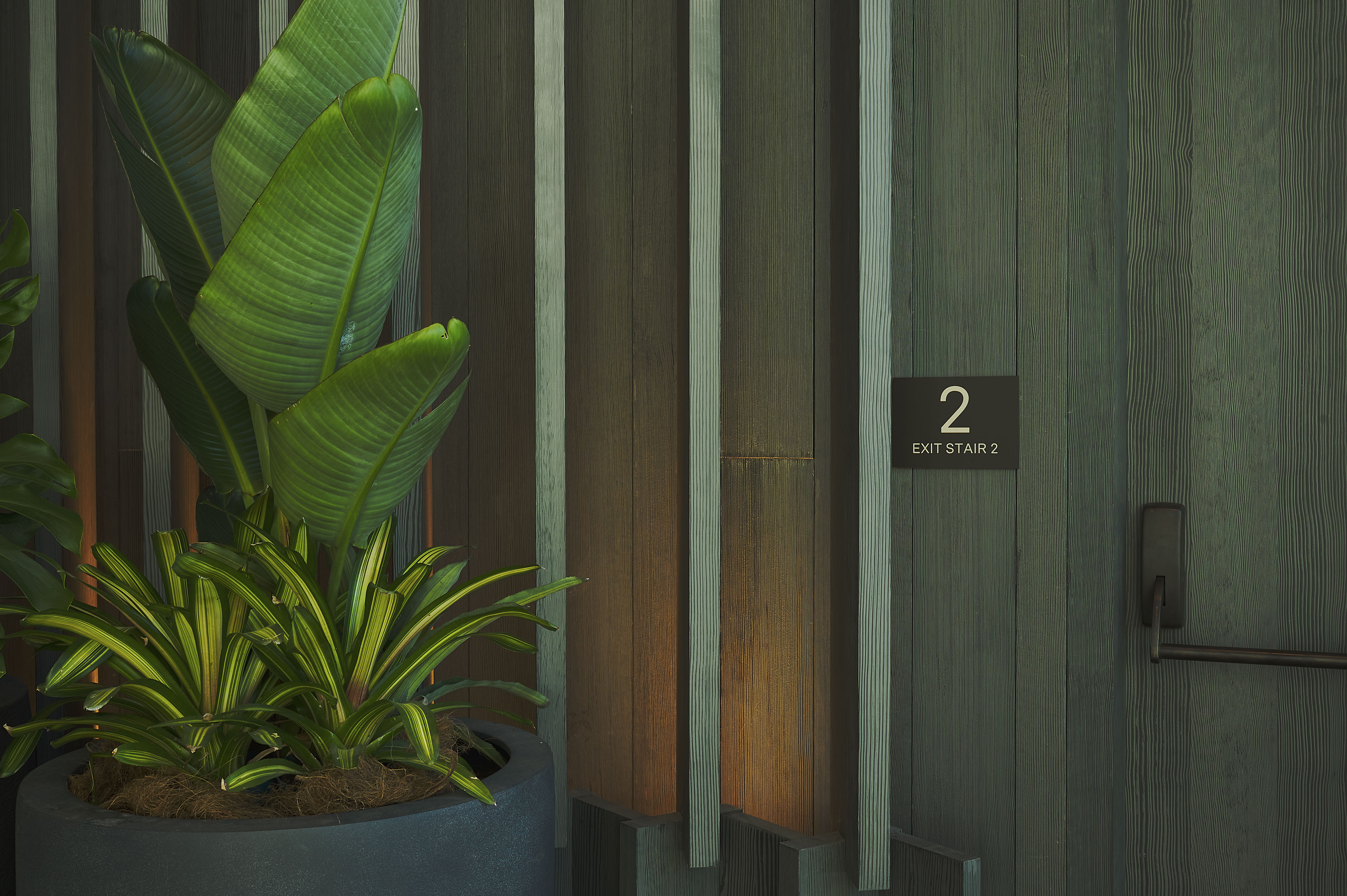 Ward Village interior residential exit stair signage, designed by Two Twelve