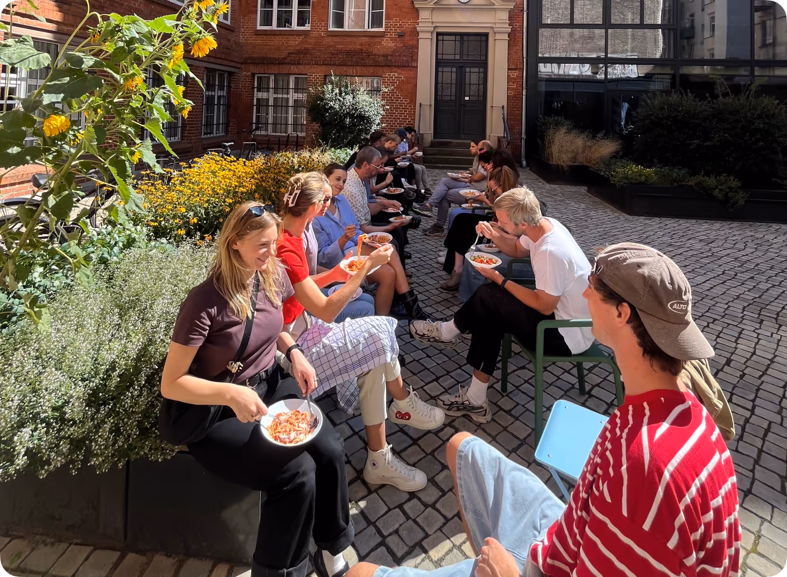 Klim team on Spaghetti Wednesday in the office courtyard