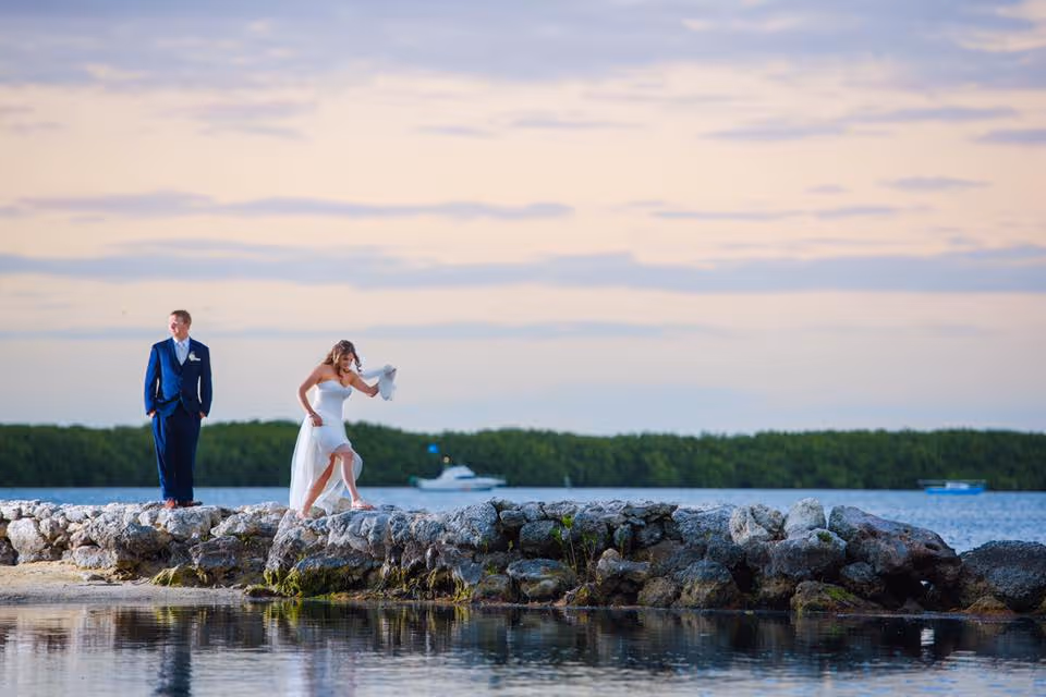 A couple gets married with friends and family at Kon Tiki Resort in Islamorada.