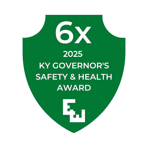 Green shield with white text stating '6x 2025 KY Governor's Safety & Health Award' and the letters EU stacked at the bottom.