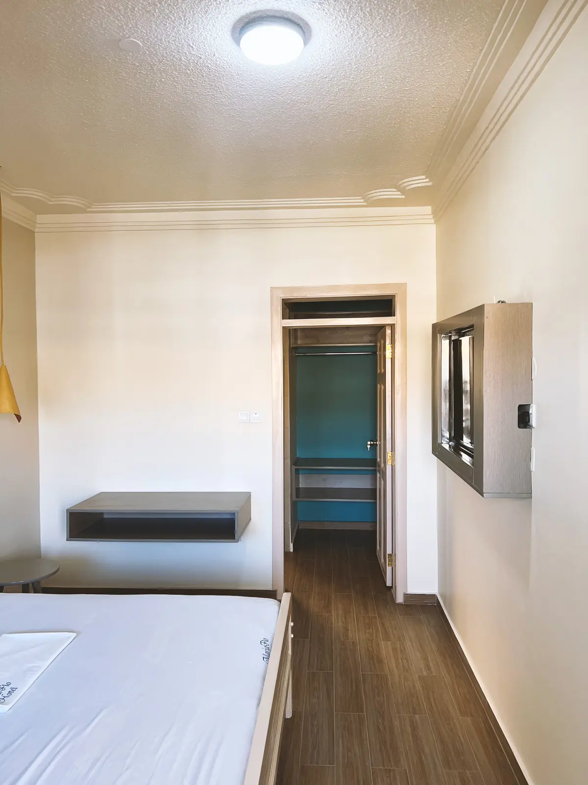 Maria Flo Hotel Masaka Guest Room in the Yellow Wing, Bathroom Entrance View