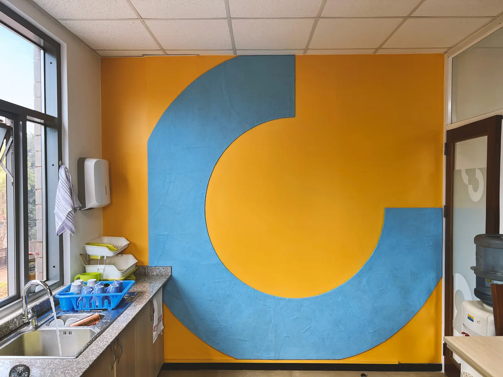 Open Capital Advisors Office Interior Renovation Kitchen Wall Painting