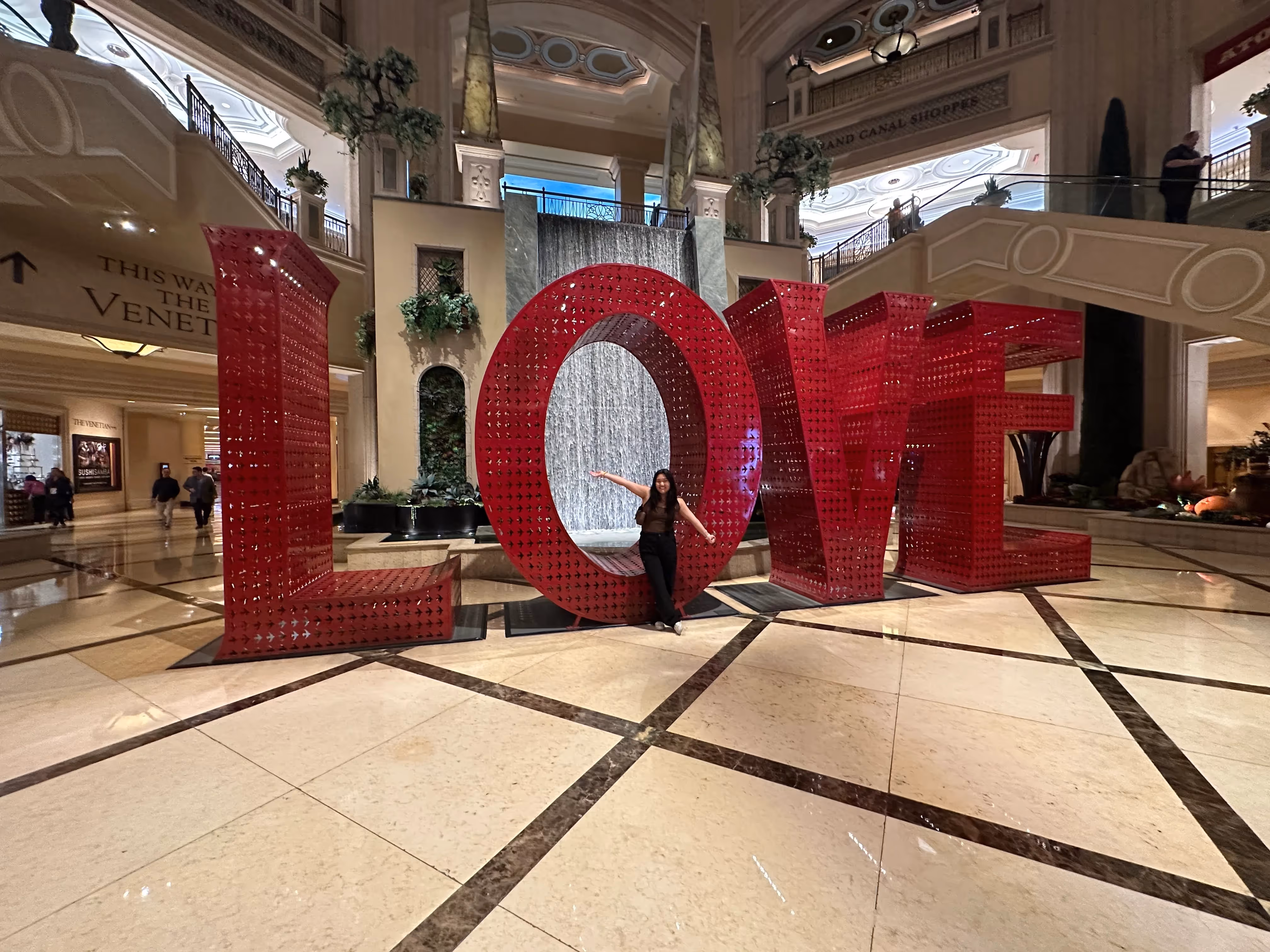 Holly and a big LOVE sign