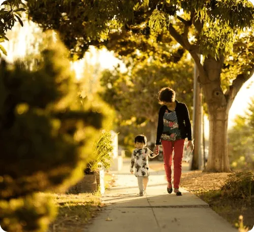 A mother and a child outside