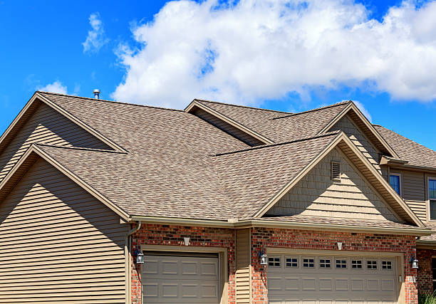 Should I Call My Insurance Company or a Roofer First After Storm Damage?