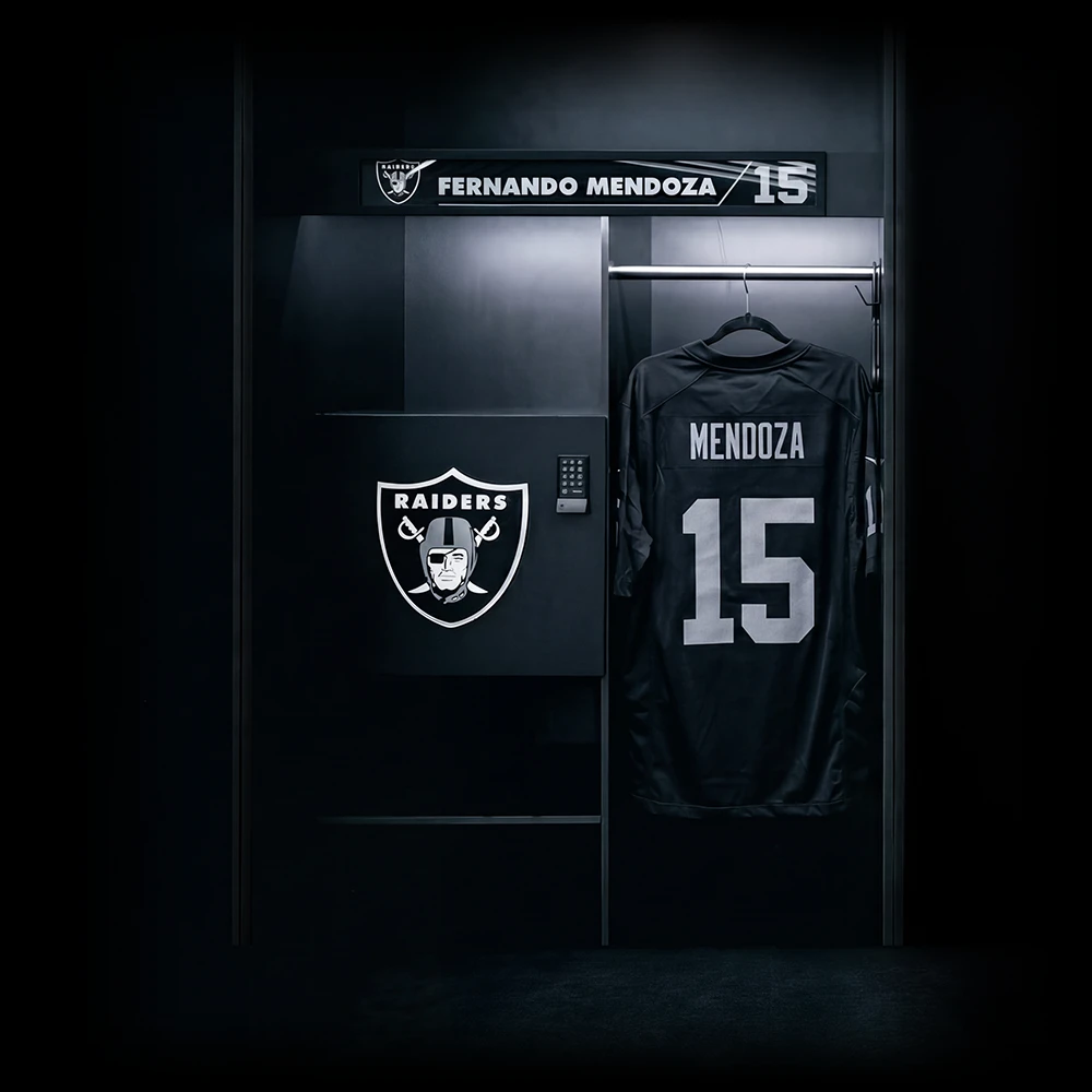 Black Raiders locker with jersey number 15 and name Mendoza hanging inside under a nameplate.