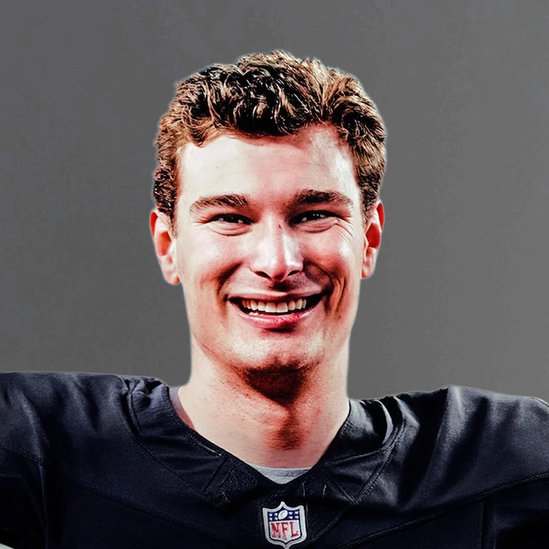 Fernando Mendoza wearing a black NFL jersey against a gray background.