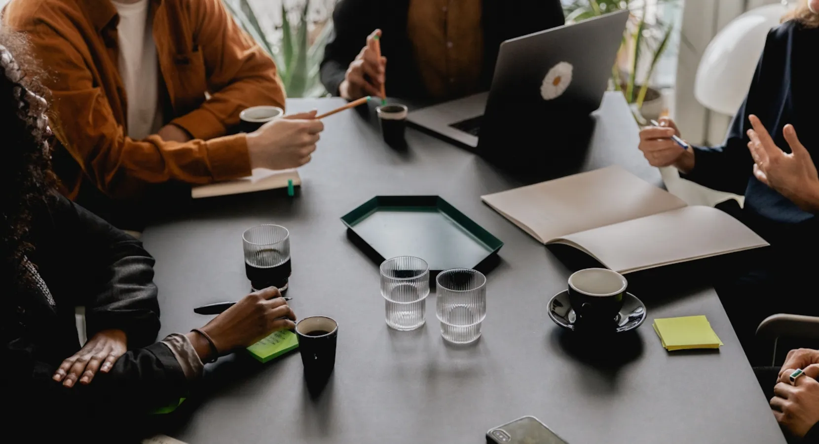 A group of RUSH team members working around a table
